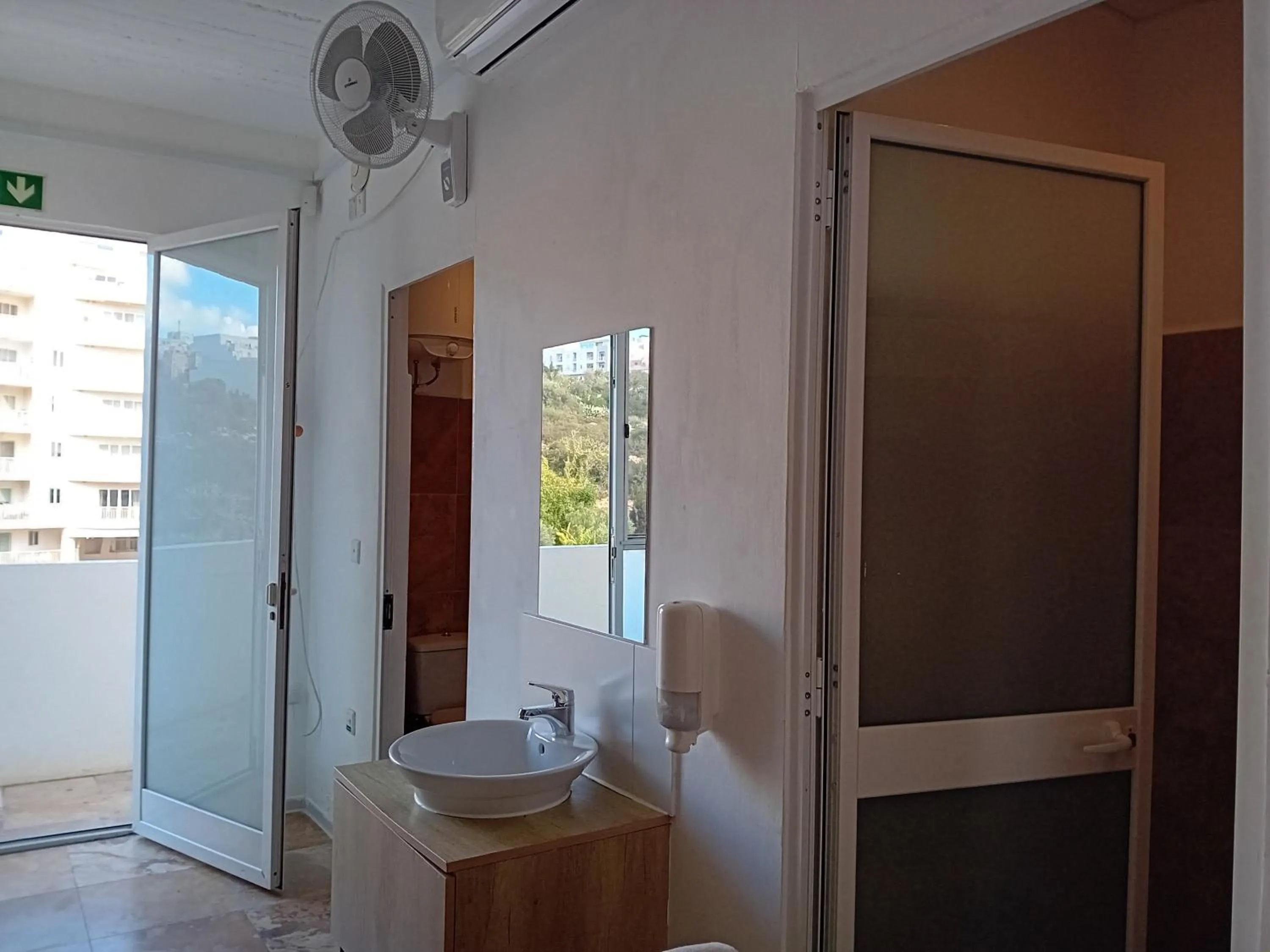 Bathroom in Follow the Sun Boutique Hostel - Pool, Breakfast & Sea Views