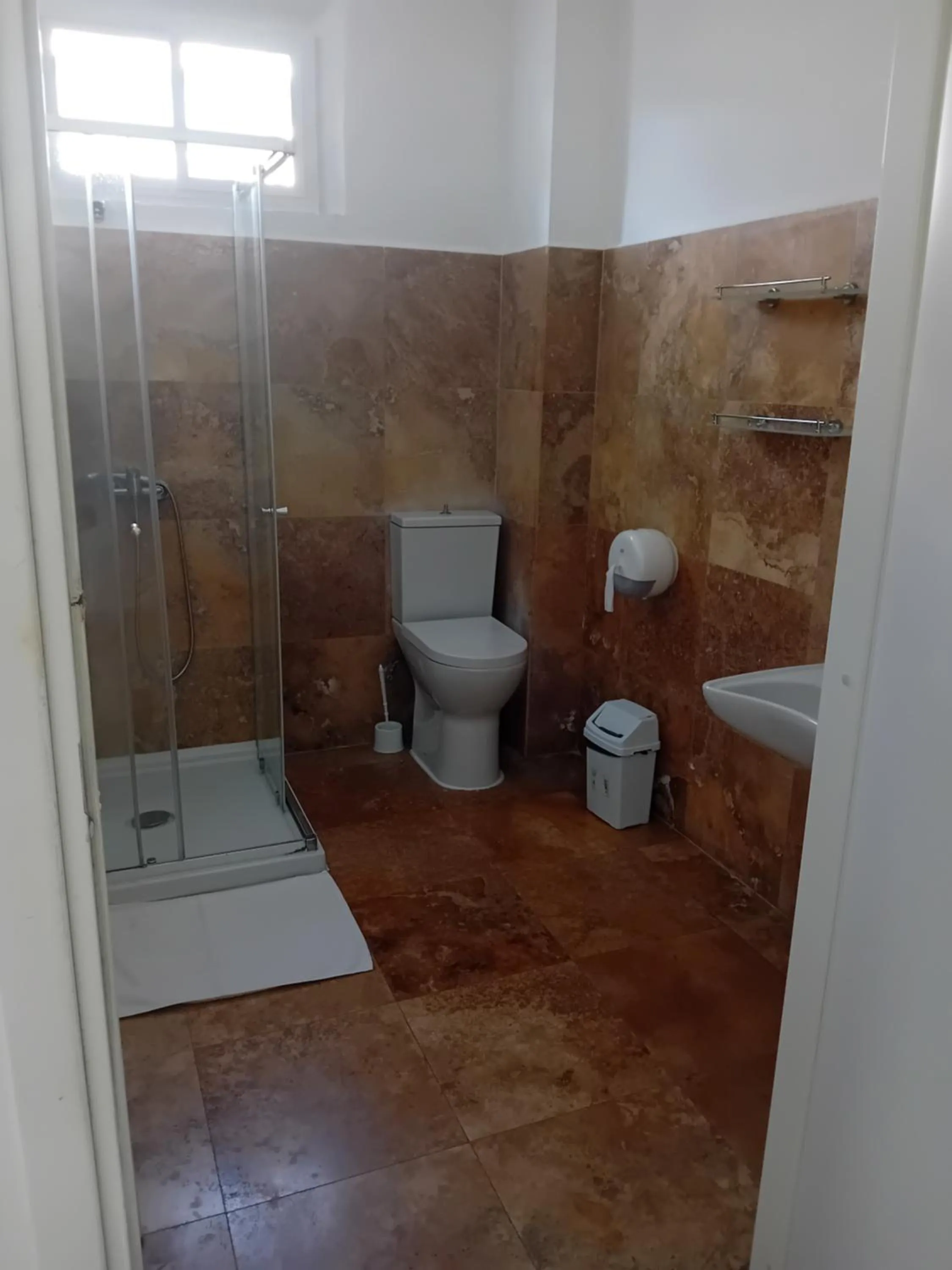 Toilet in Follow the Sun Boutique Hostel - Pool, Breakfast & Sea Views