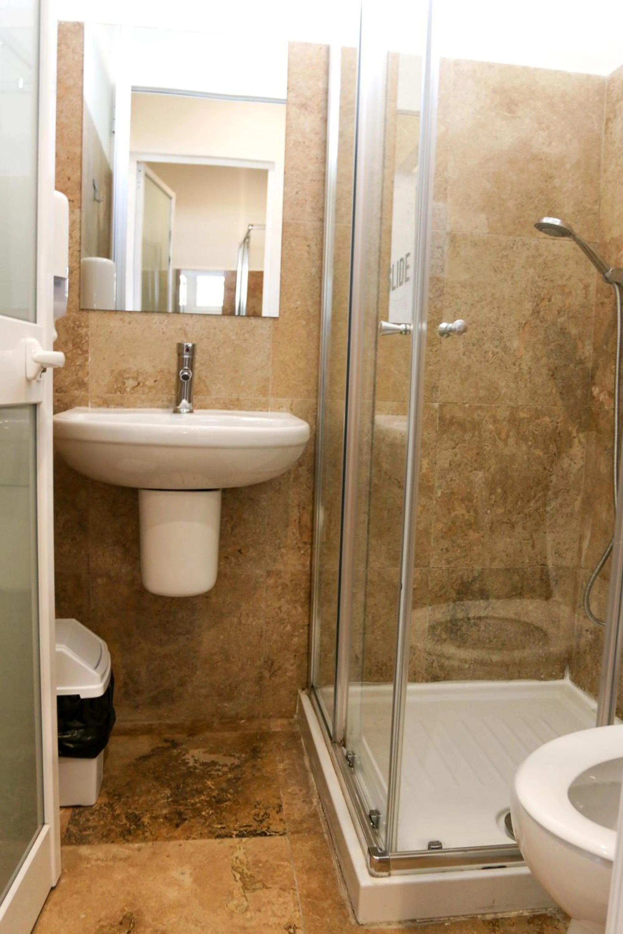 Shower in Follow the Sun Boutique Hostel - Pool, Breakfast & Sea Views