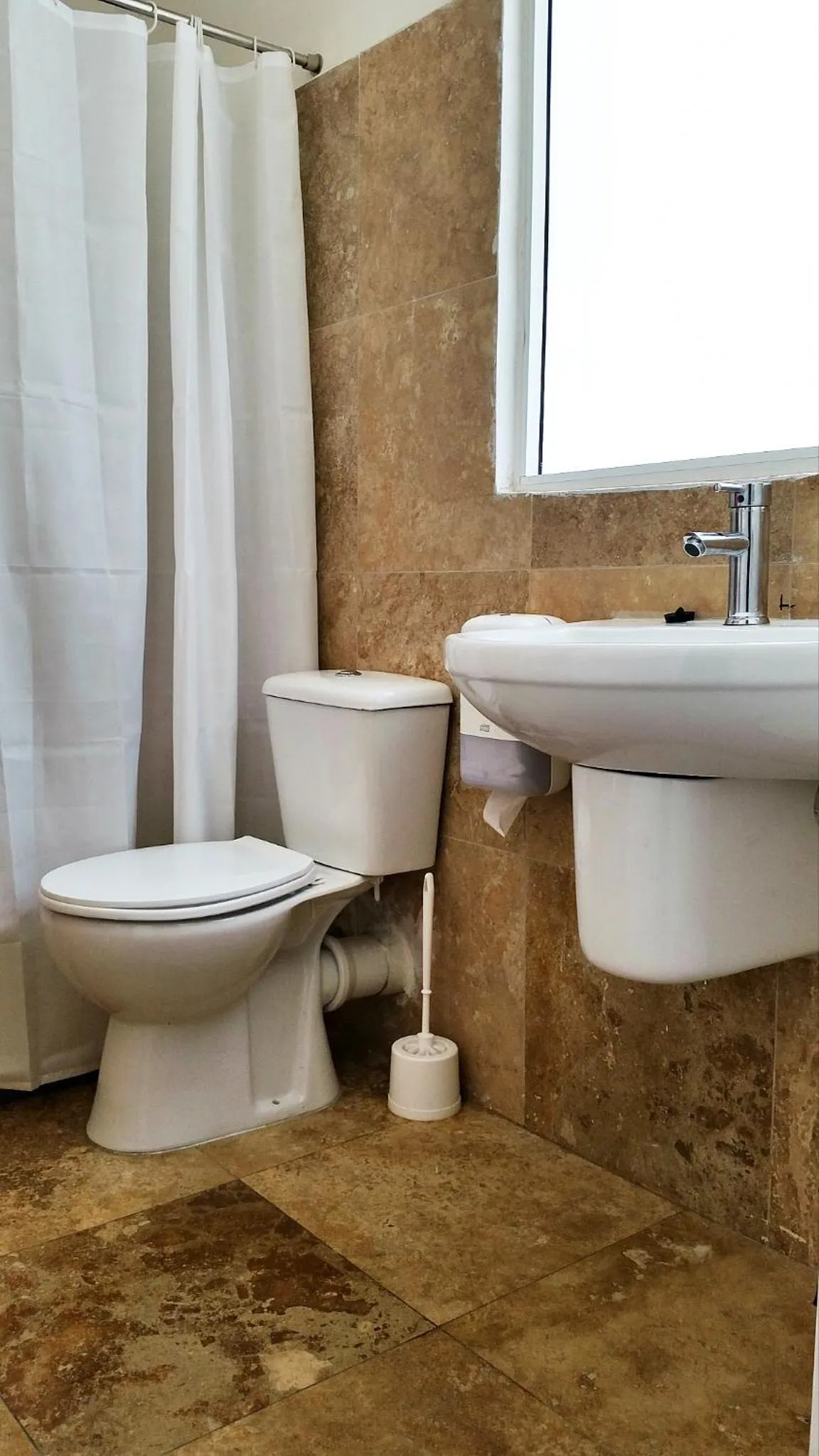 Bathroom in Follow the Sun Boutique Hostel - Pool, Breakfast & Sea Views