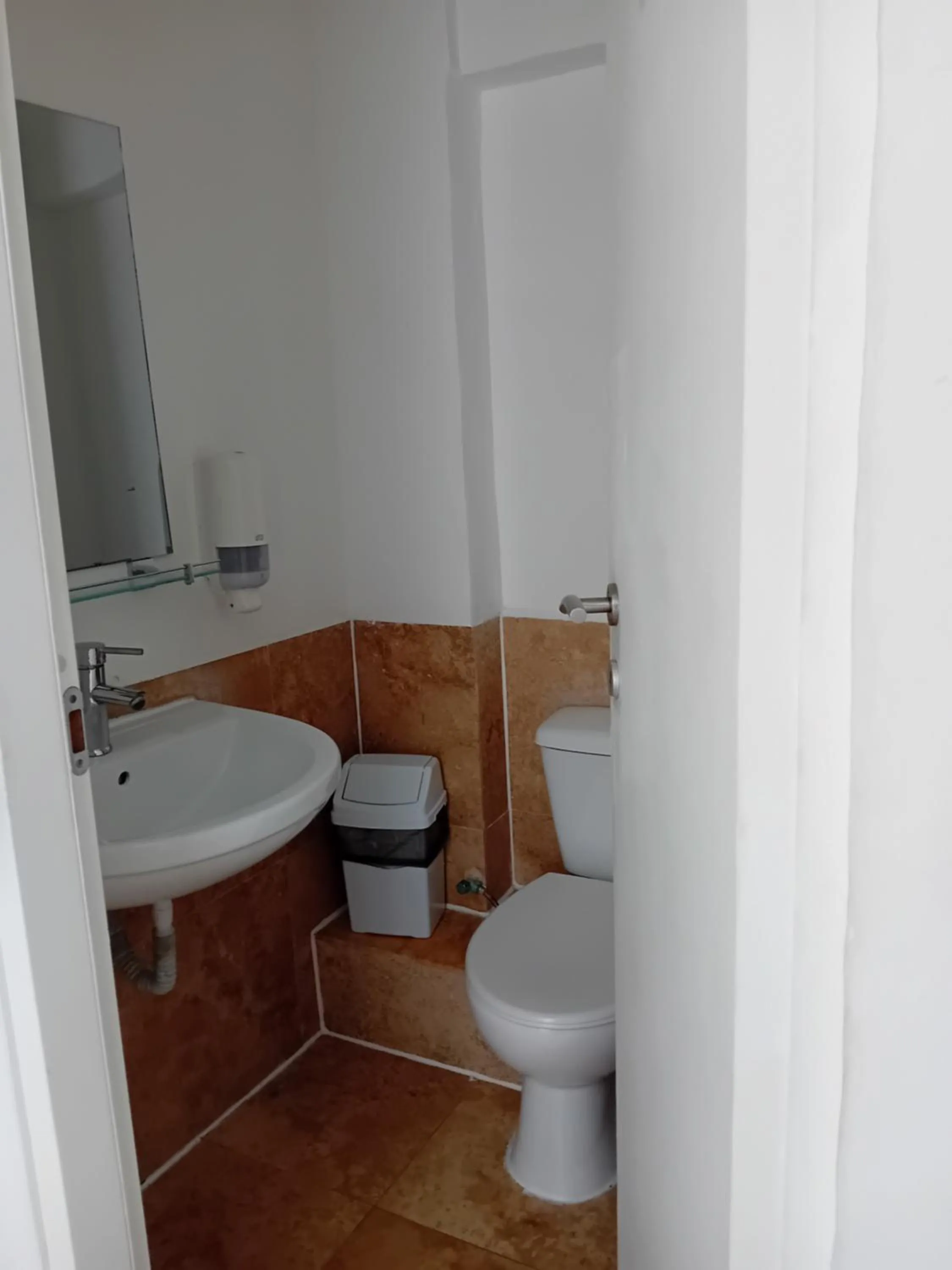 Bathroom in Follow the Sun Boutique Hostel - Pool, Breakfast & Sea Views