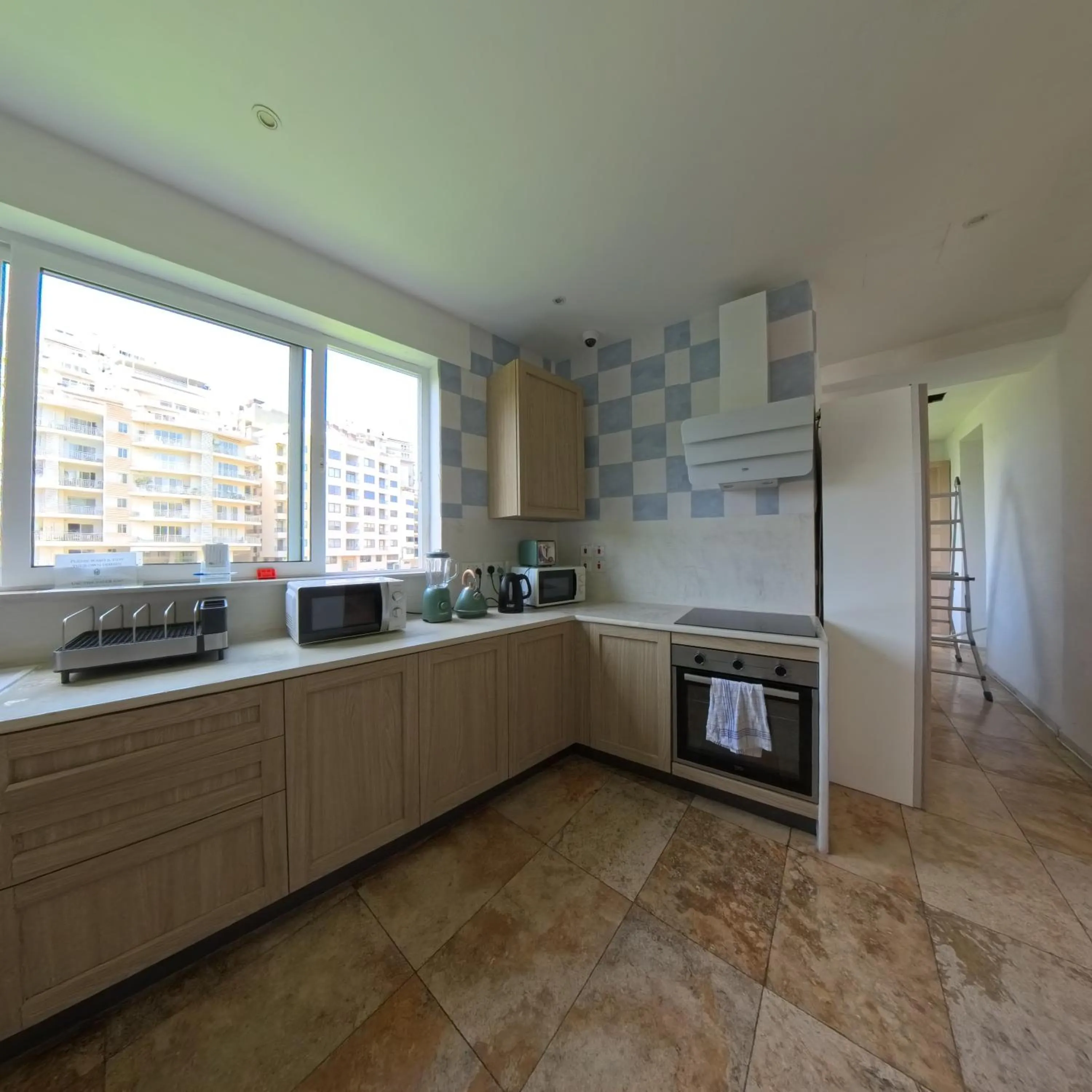 kitchen in Follow the Sun Boutique Hostel - Pool, Breakfast & Sea Views