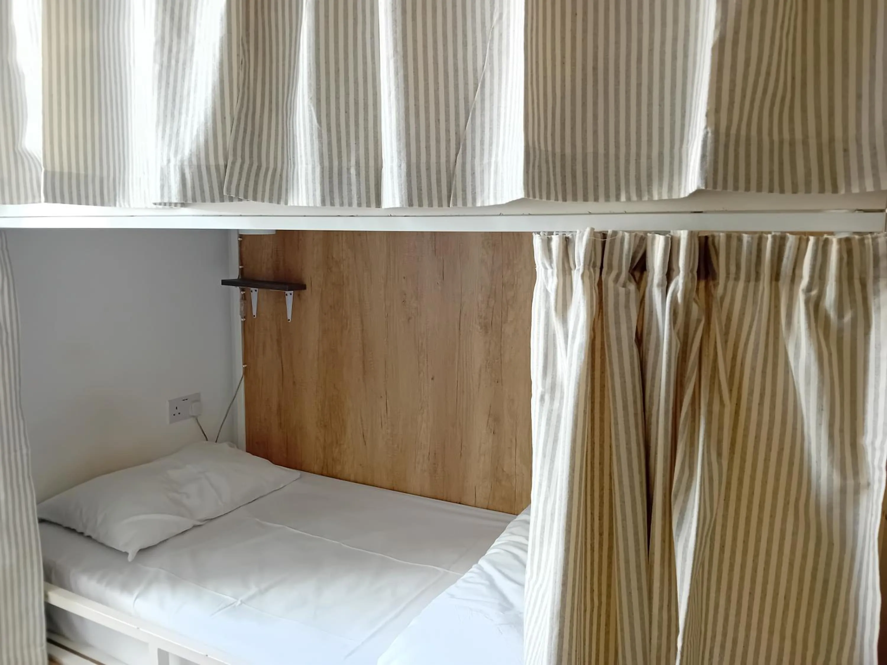 Bed in Follow the Sun Boutique Hostel - Pool, Breakfast & Sea Views