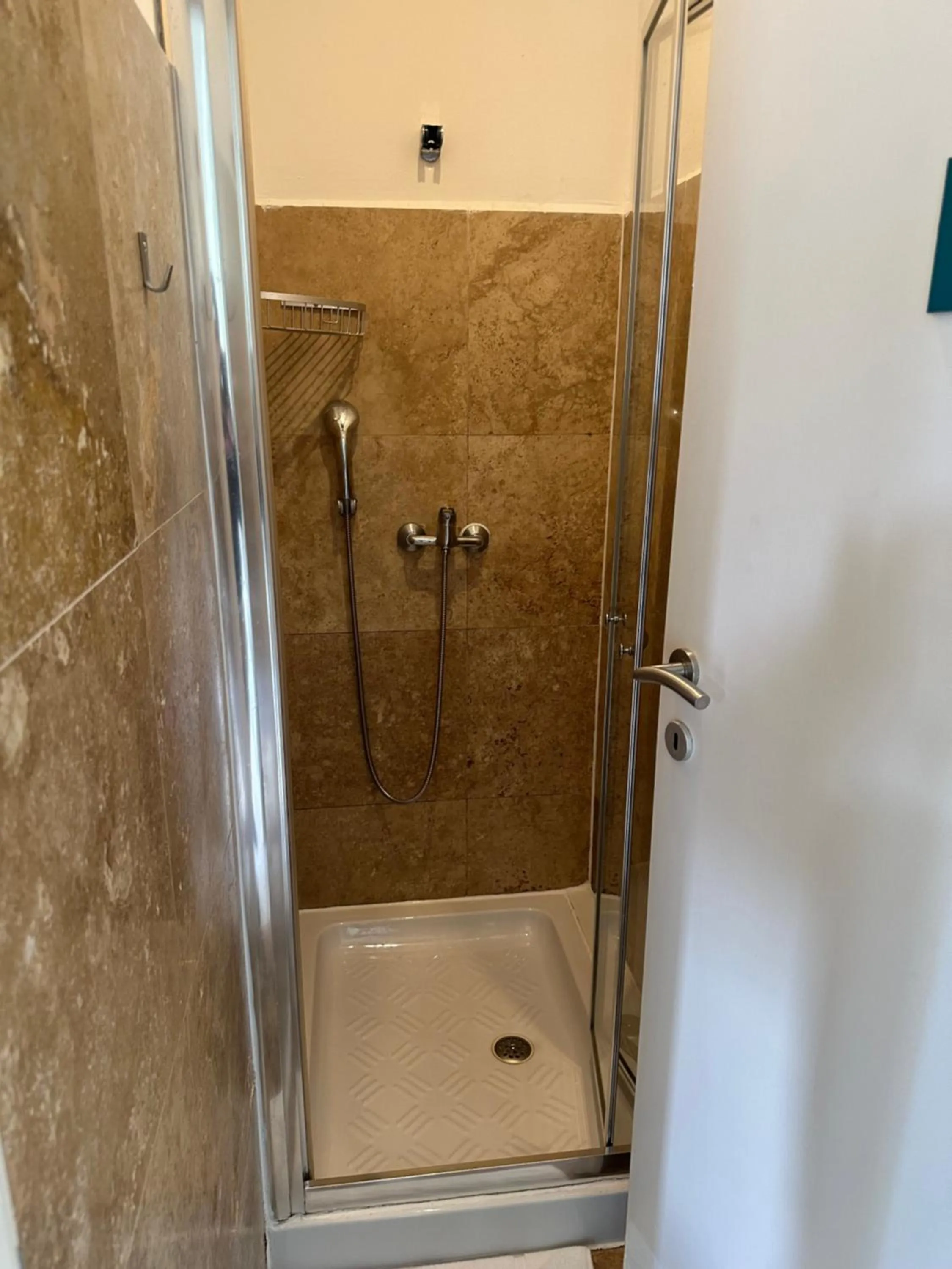 Shower in Follow the Sun Boutique Hostel - Pool, Breakfast & Sea Views