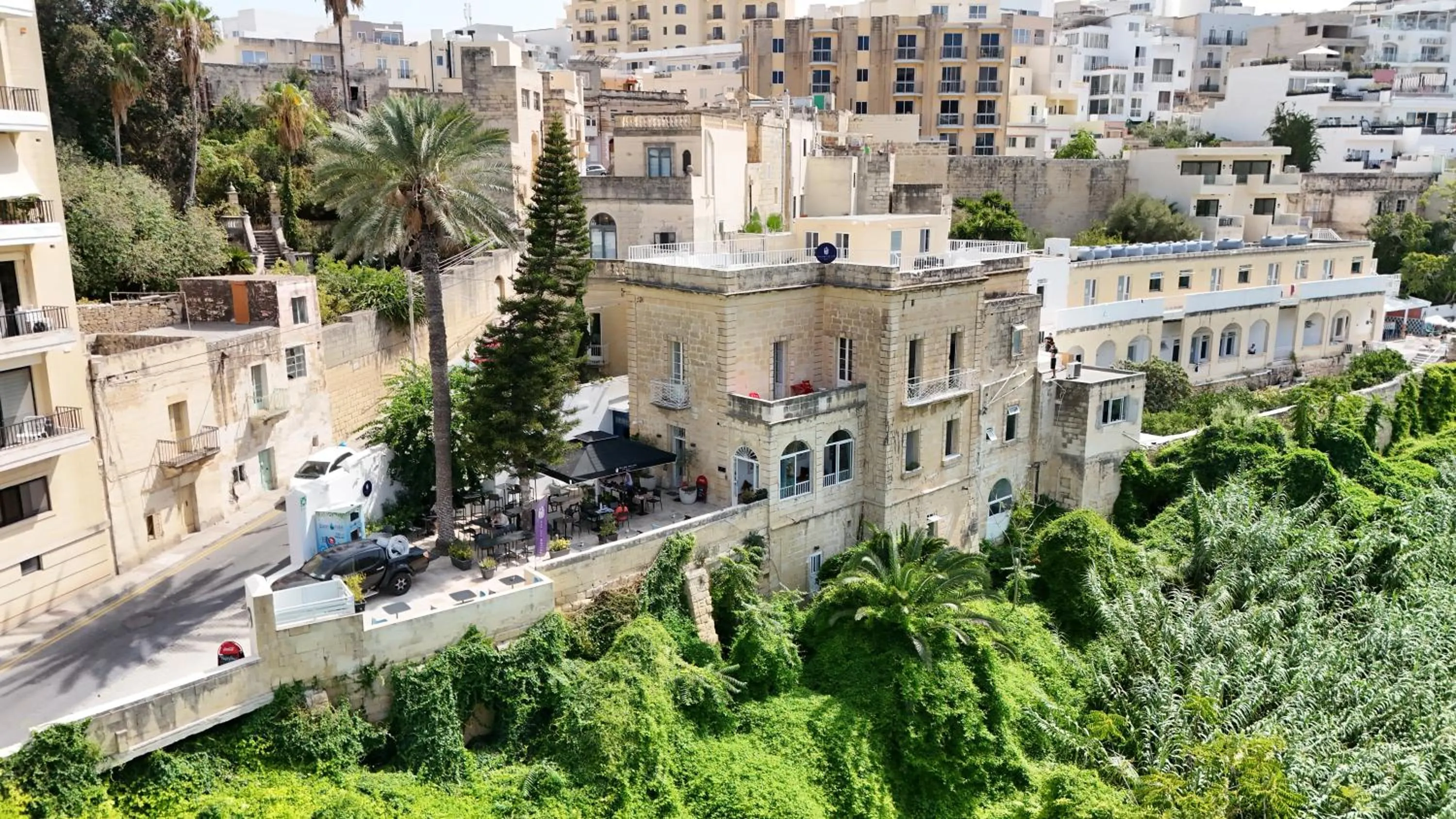 Property building in Follow the Sun Boutique Hostel - Pool, Breakfast & Sea Views