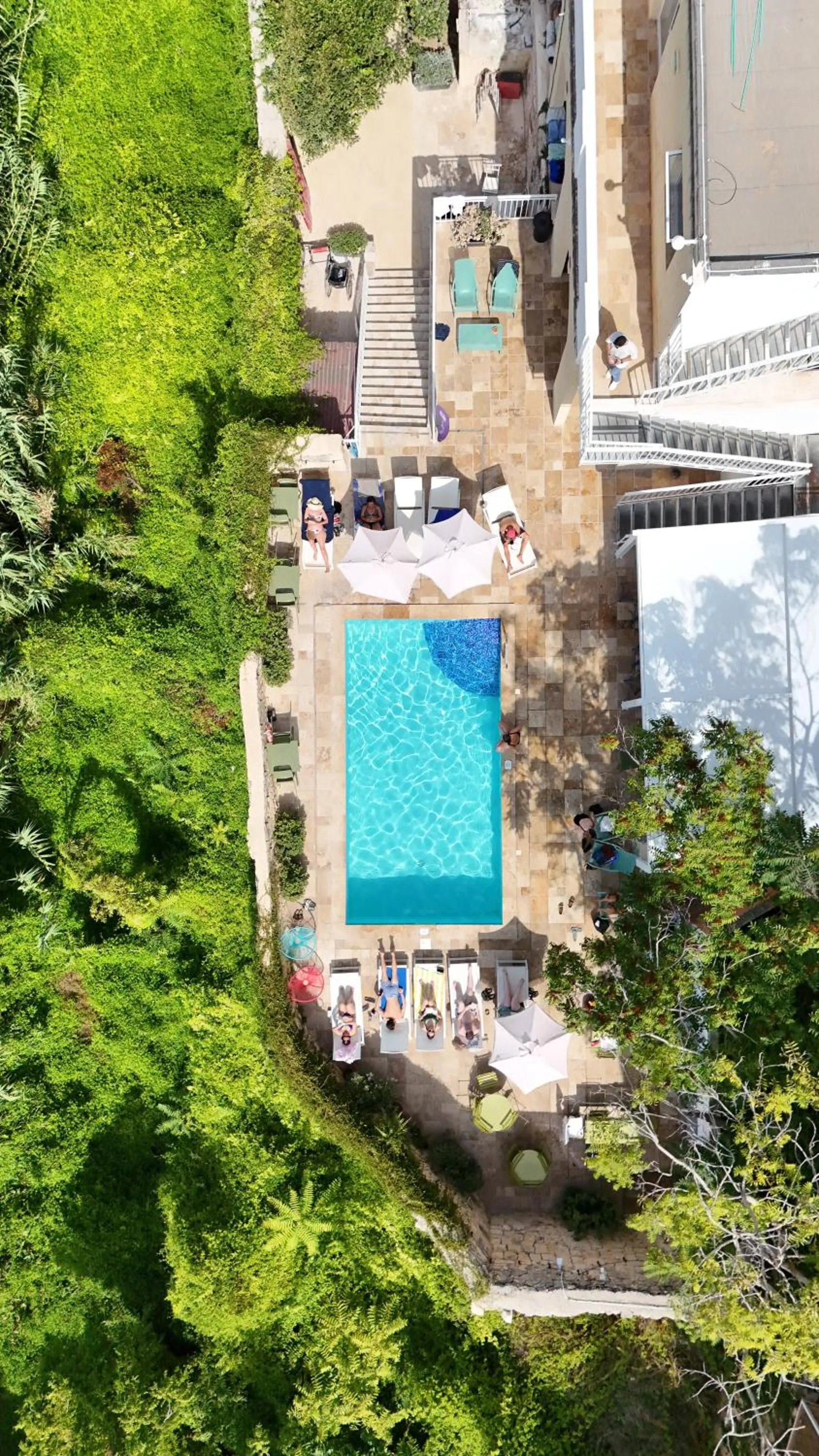 Pool view in Follow the Sun Boutique Hostel - Pool, Breakfast & Sea Views