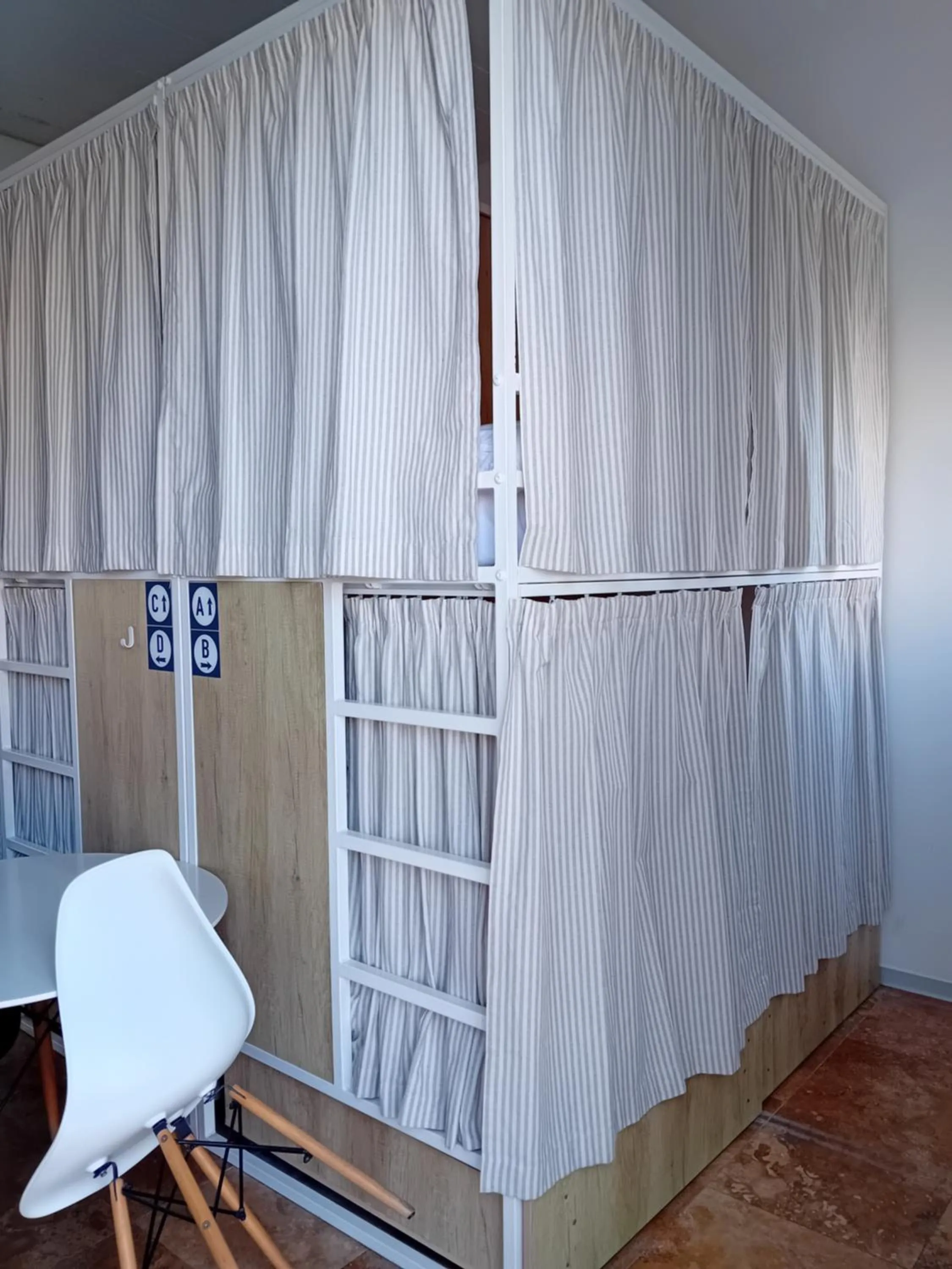 Photo of the whole room in Follow the Sun Boutique Hostel - Pool, Breakfast & Sea Views