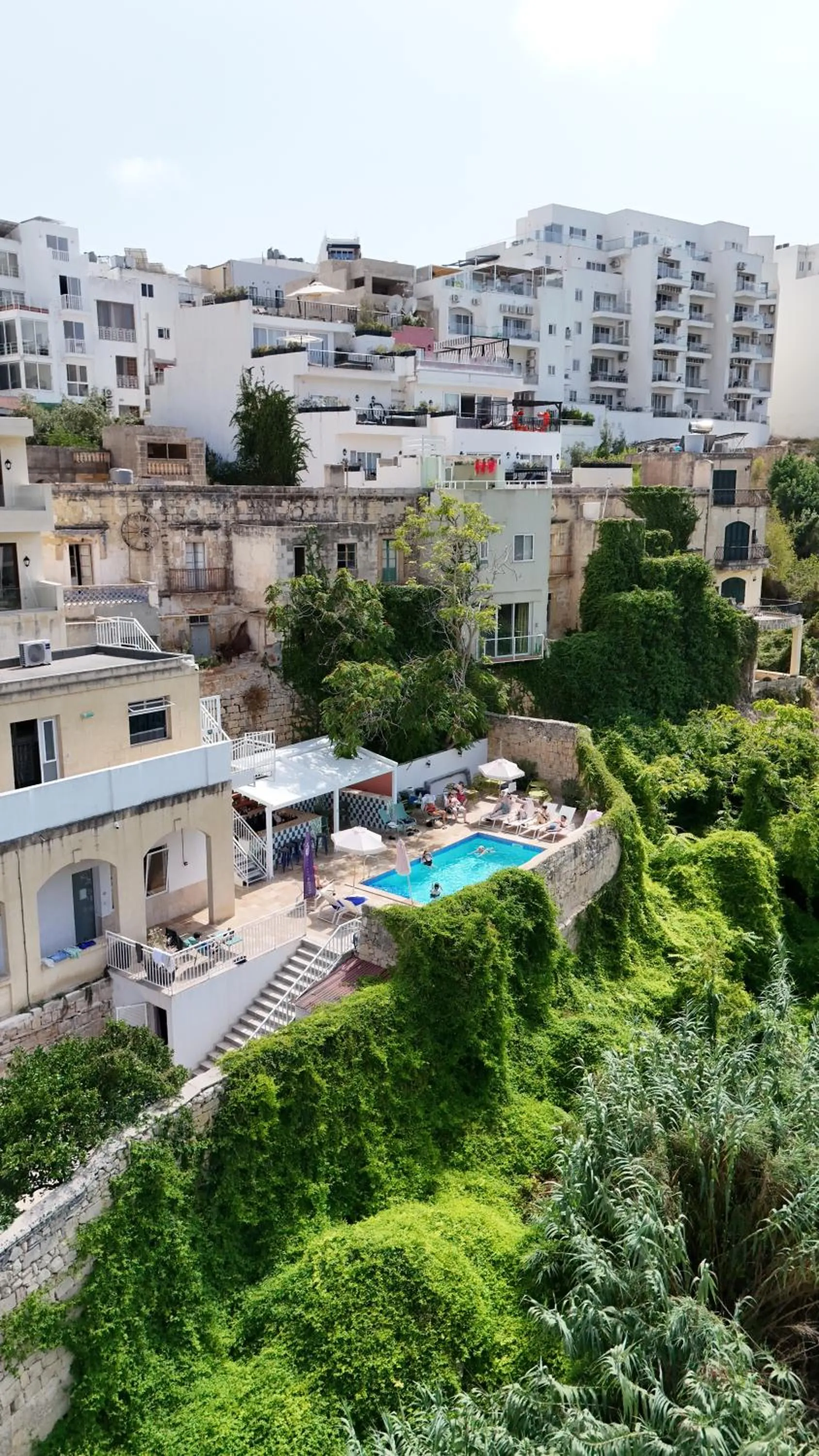 Property building in Follow the Sun Boutique Hostel - Pool, Breakfast & Sea Views