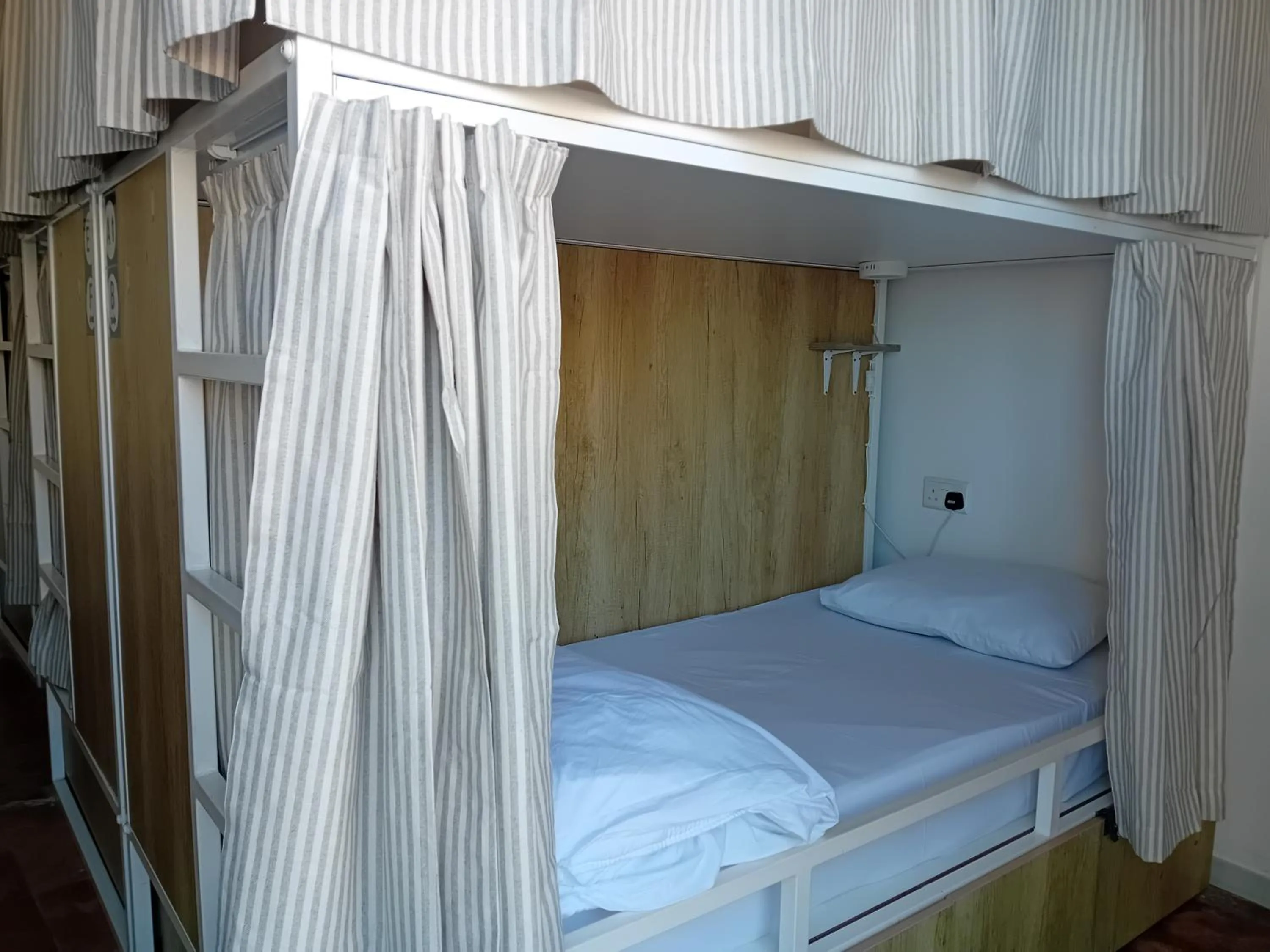 Bed in Follow the Sun Boutique Hostel - Pool, Breakfast & Sea Views