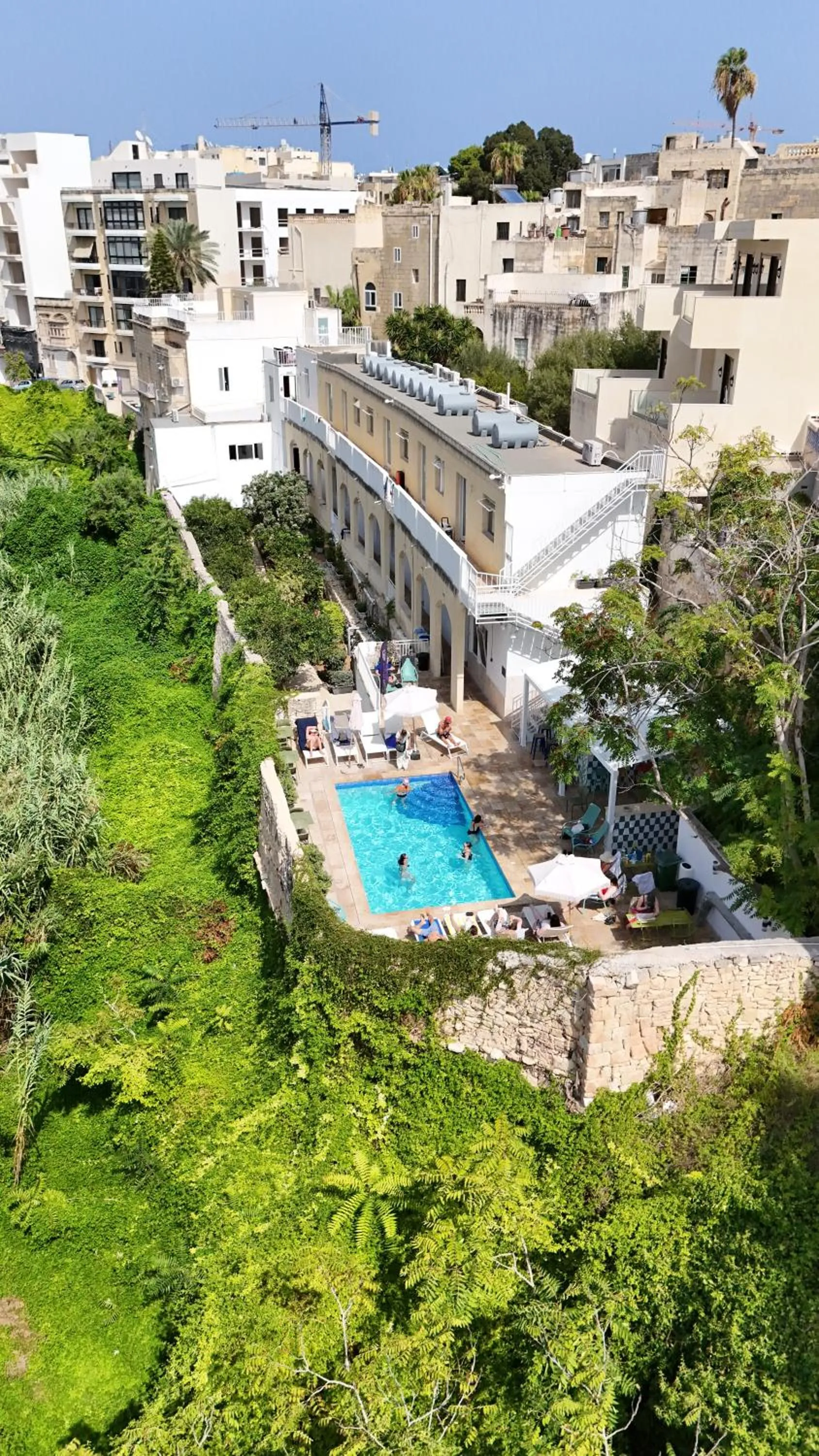 Property building in Follow the Sun Boutique Hostel - Pool, Breakfast & Sea Views