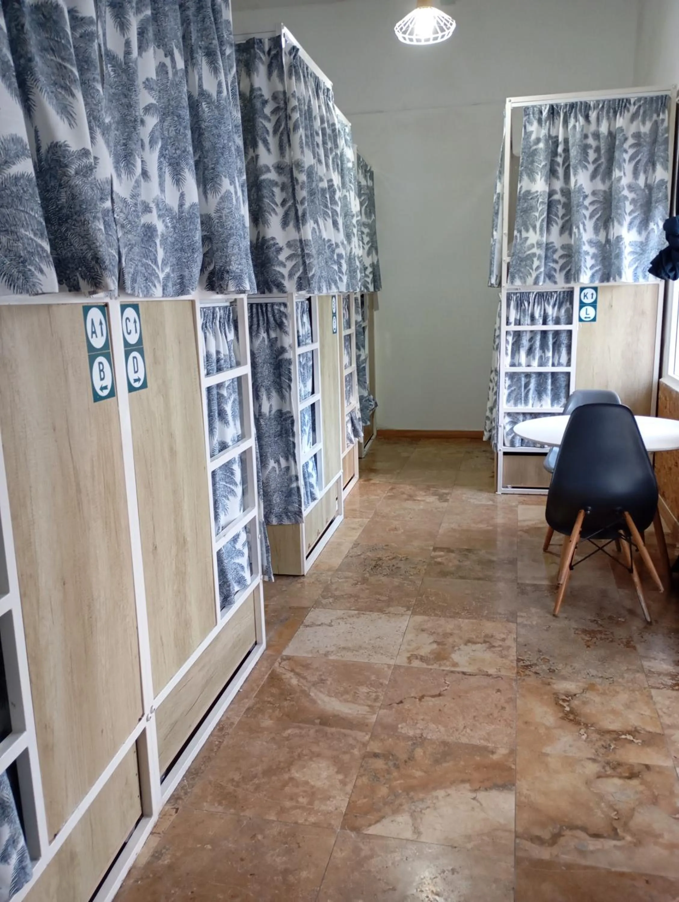 bunk bed in Follow the Sun Boutique Hostel - Pool, Breakfast & Sea Views