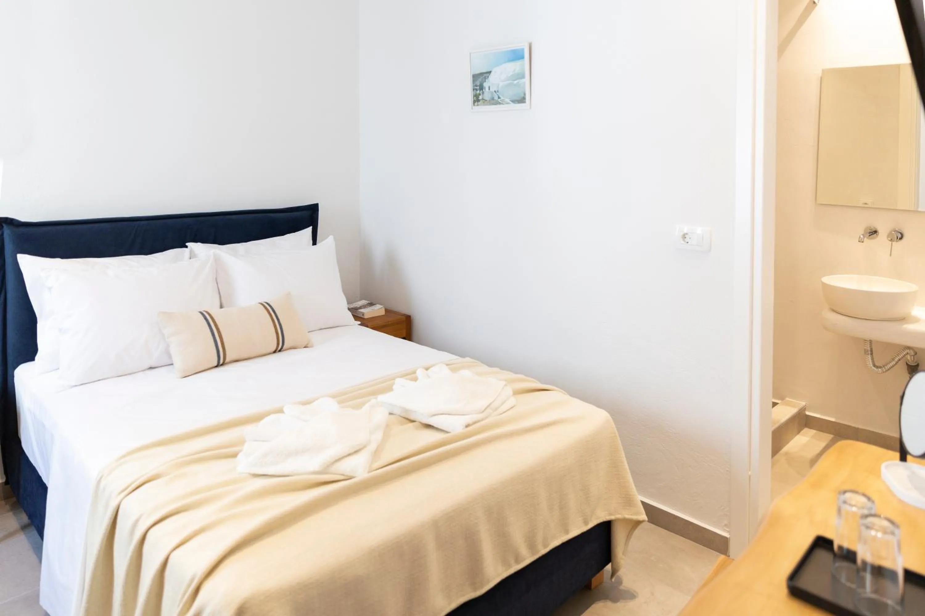 Bed in Asimina Hotel