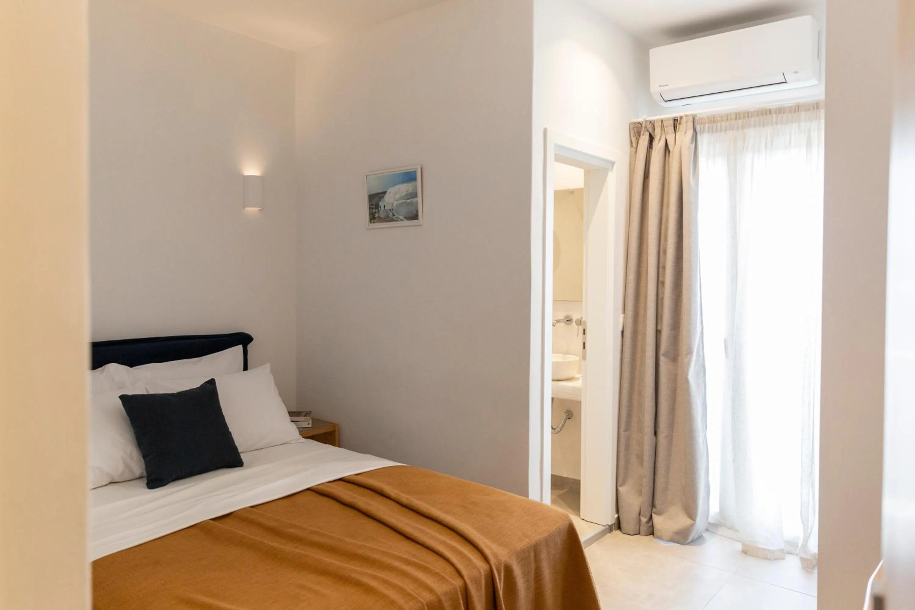 Bed in Asimina Hotel