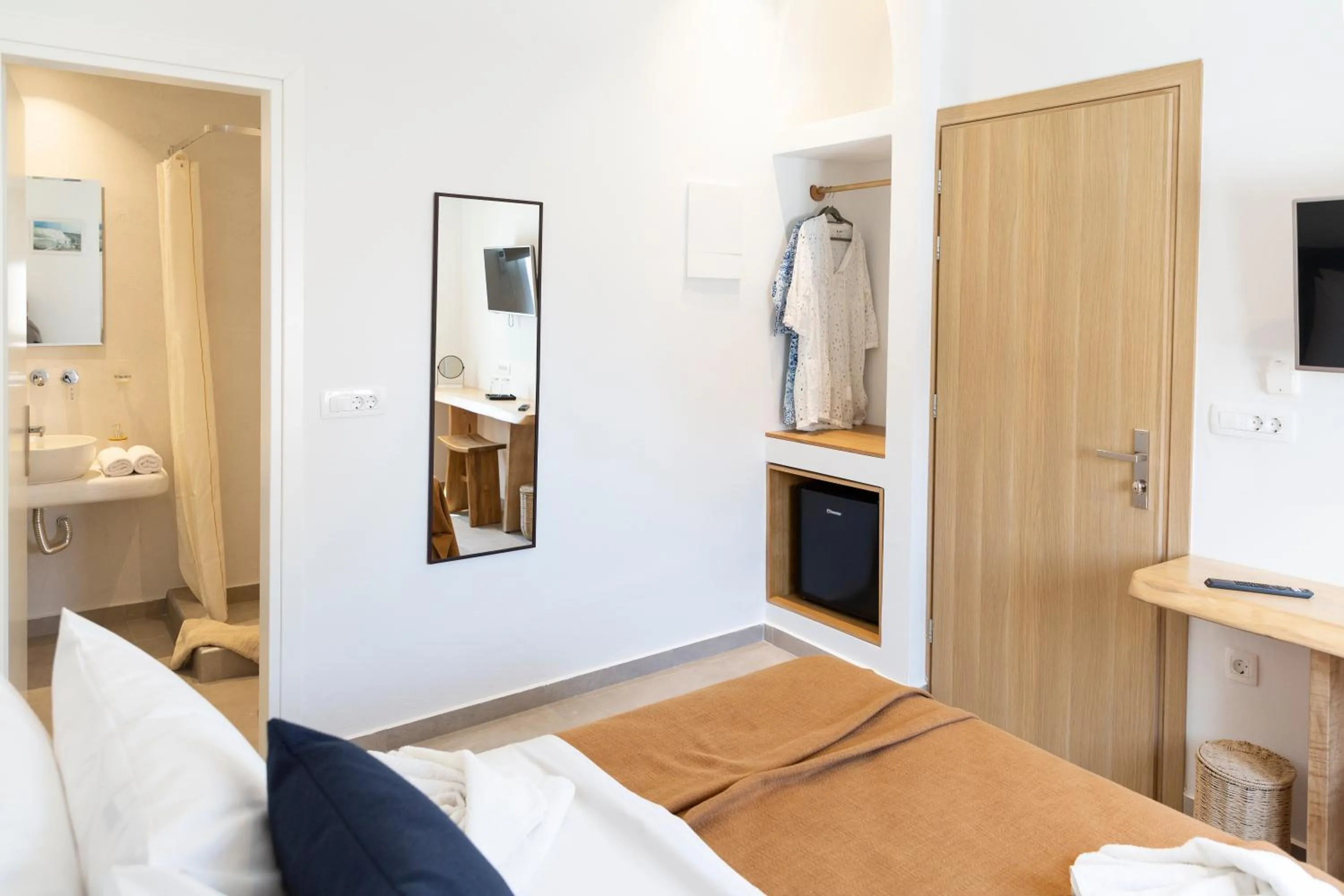 Bed in Asimina Hotel