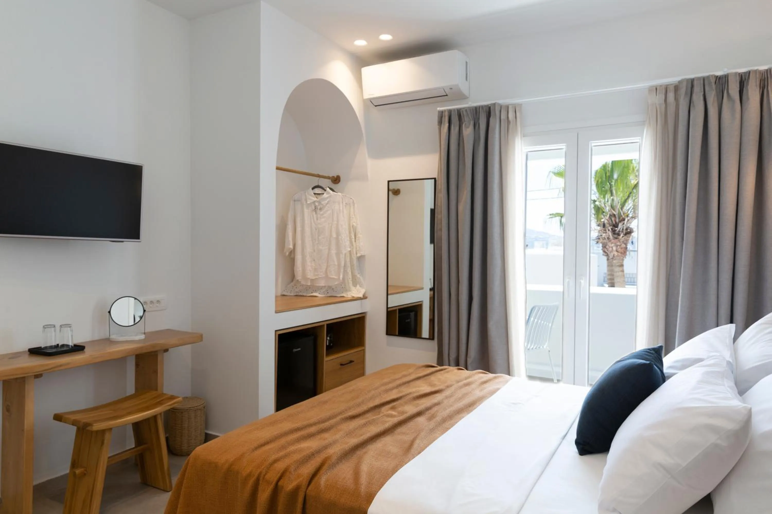 Bed in Asimina Hotel