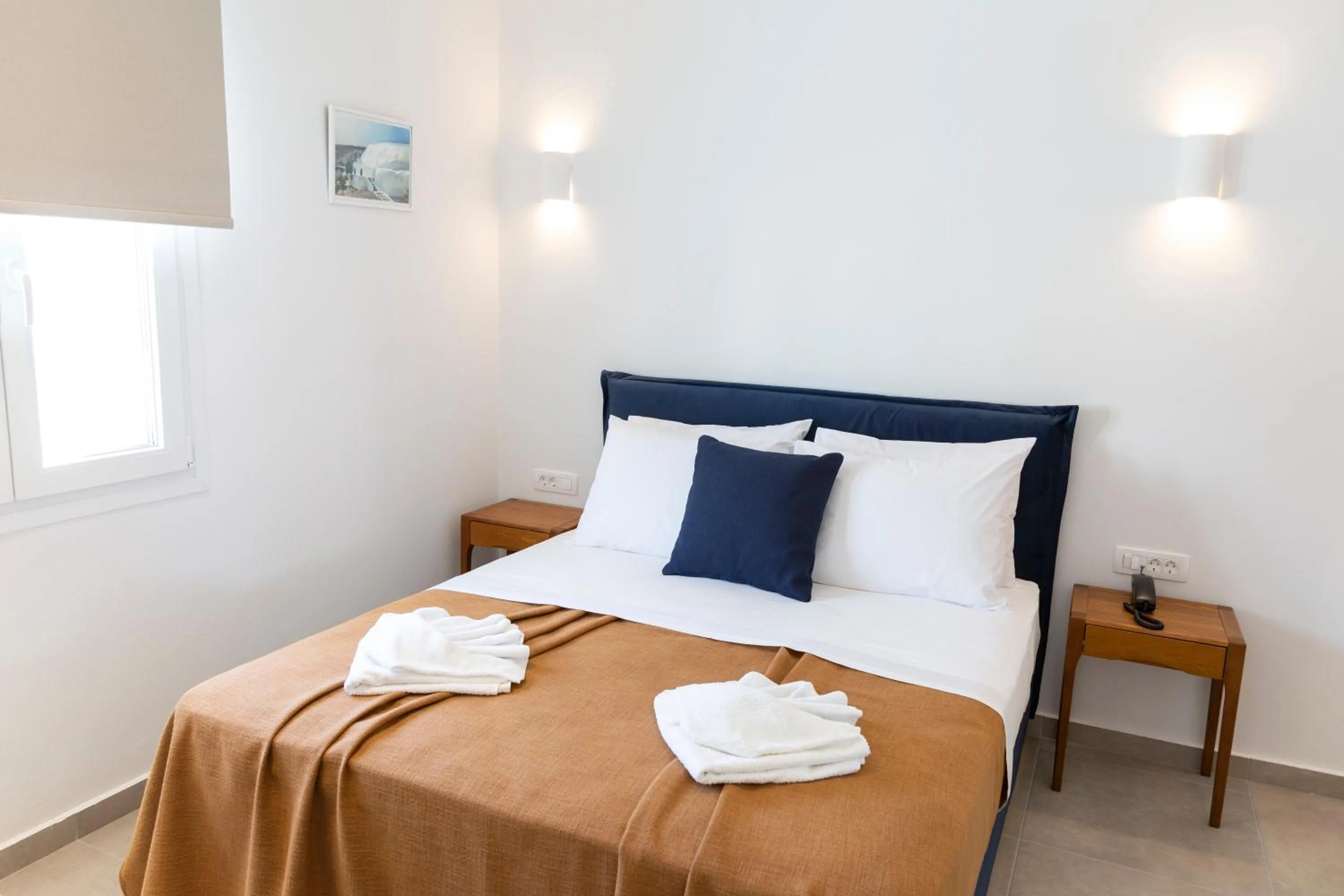 Bed in Asimina Hotel