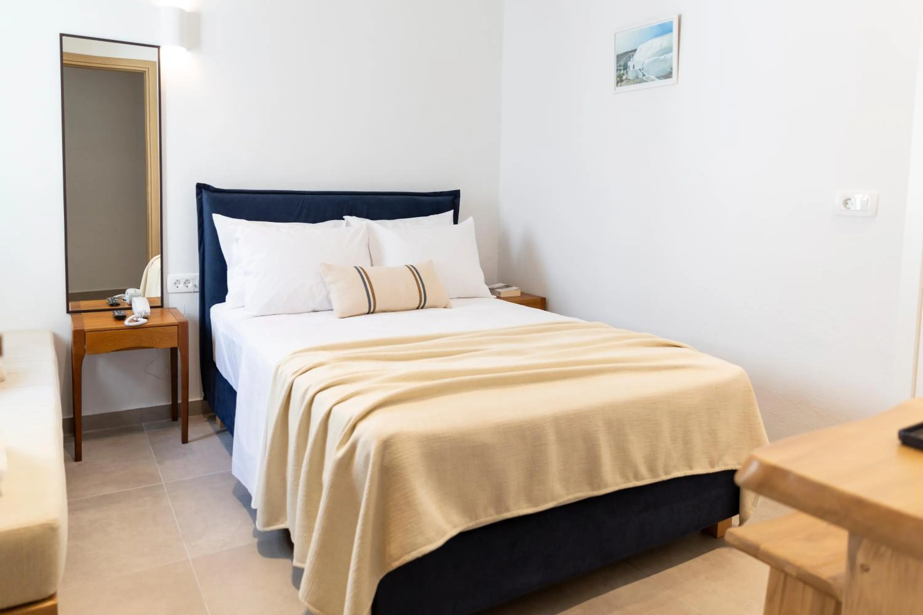 Bed in Asimina Hotel