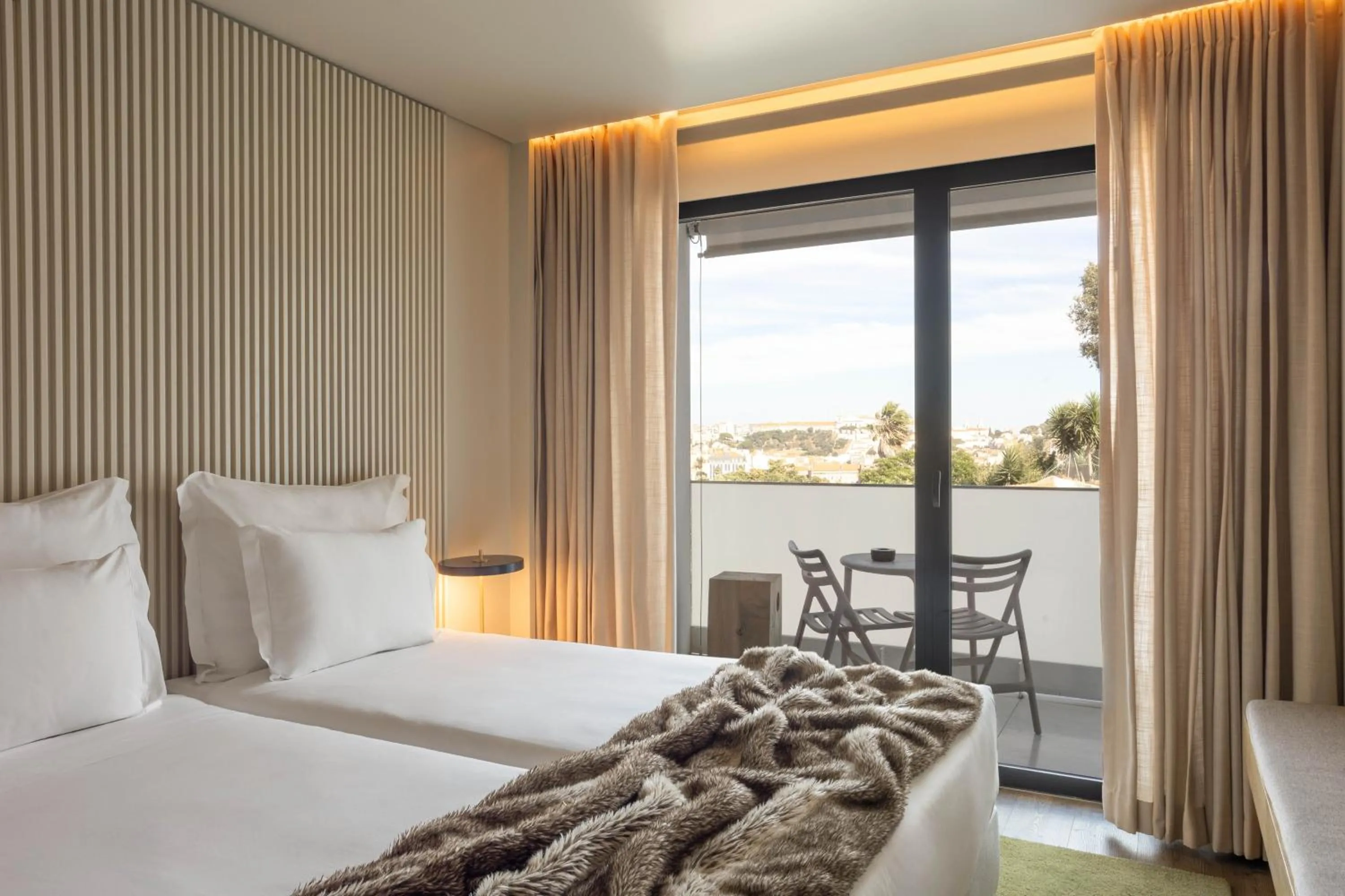 Bed in Memmo Príncipe Real, a Member of Design Hotels