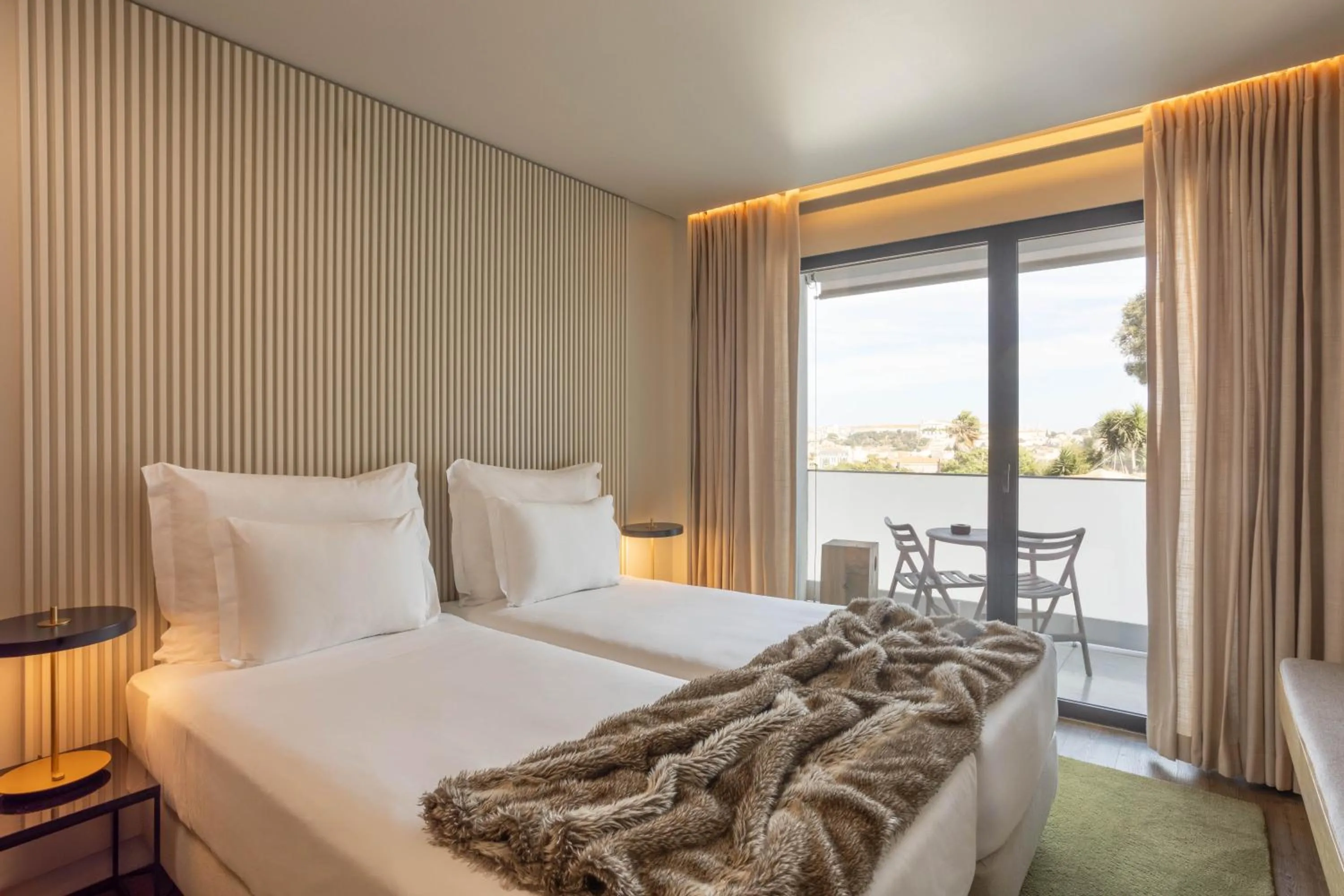 Bed in Memmo Príncipe Real, a Member of Design Hotels