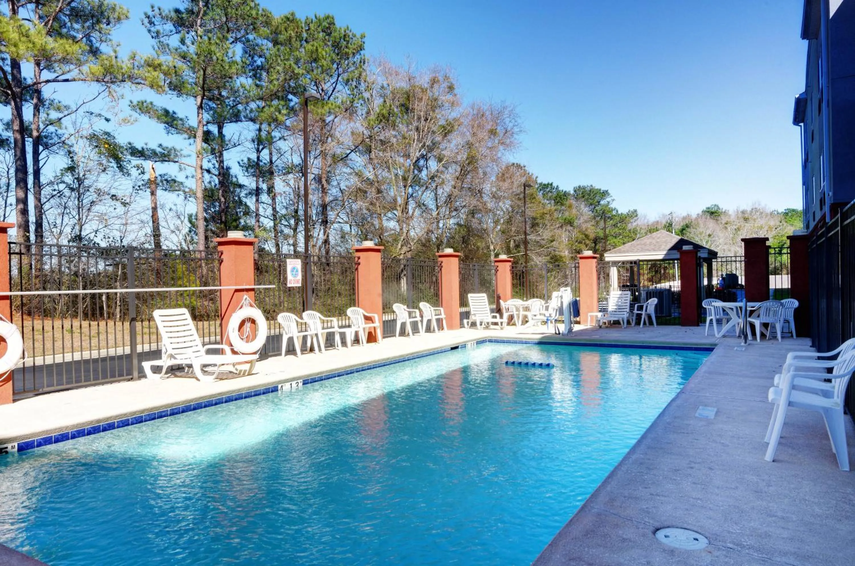 Swimming pool in Candlewood Suites Enterprise by IHG