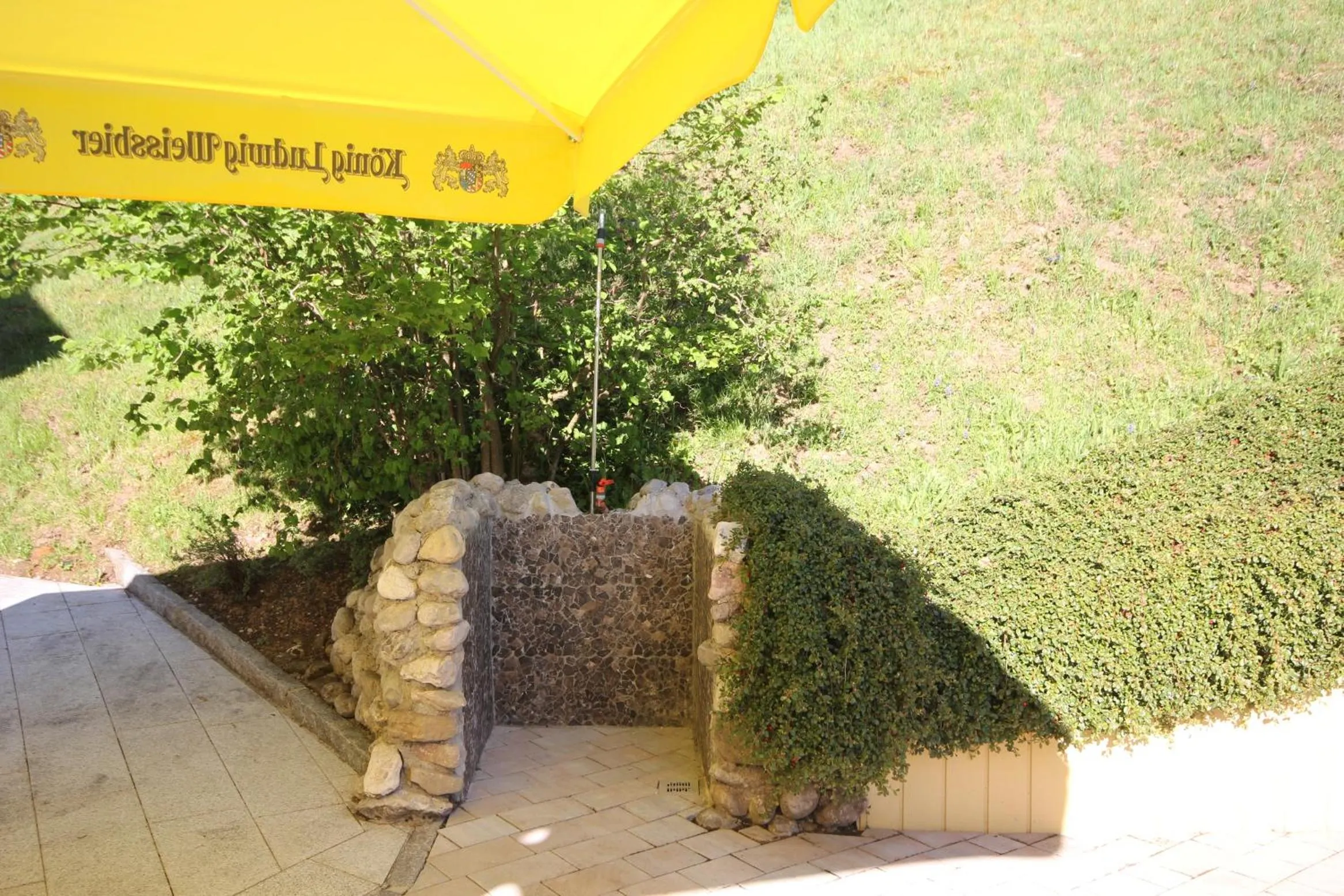 Garden view in Hotel Landhaus Ausswinkl