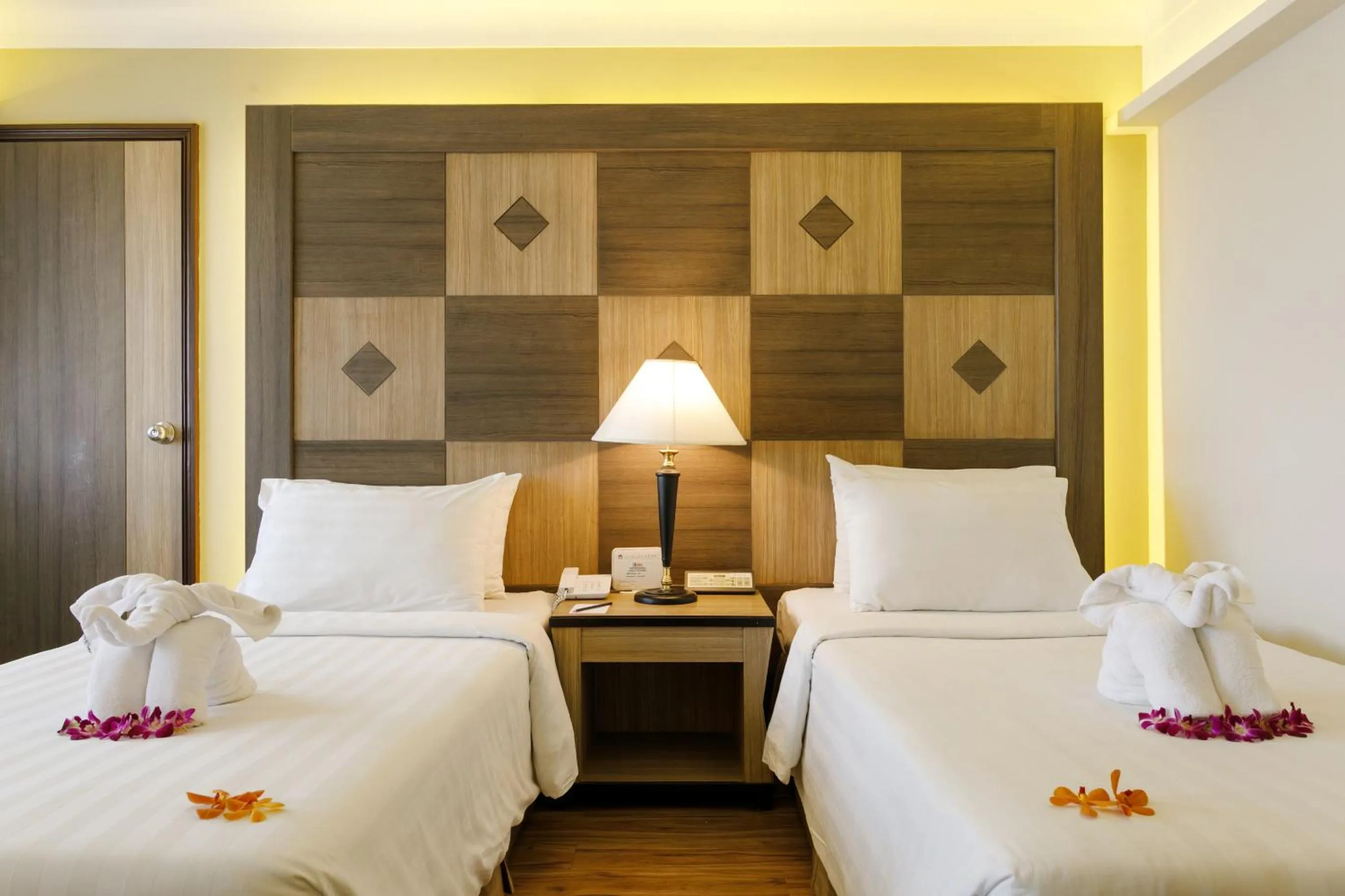 Bed in Amora Thapae Hotel Chiang Mai