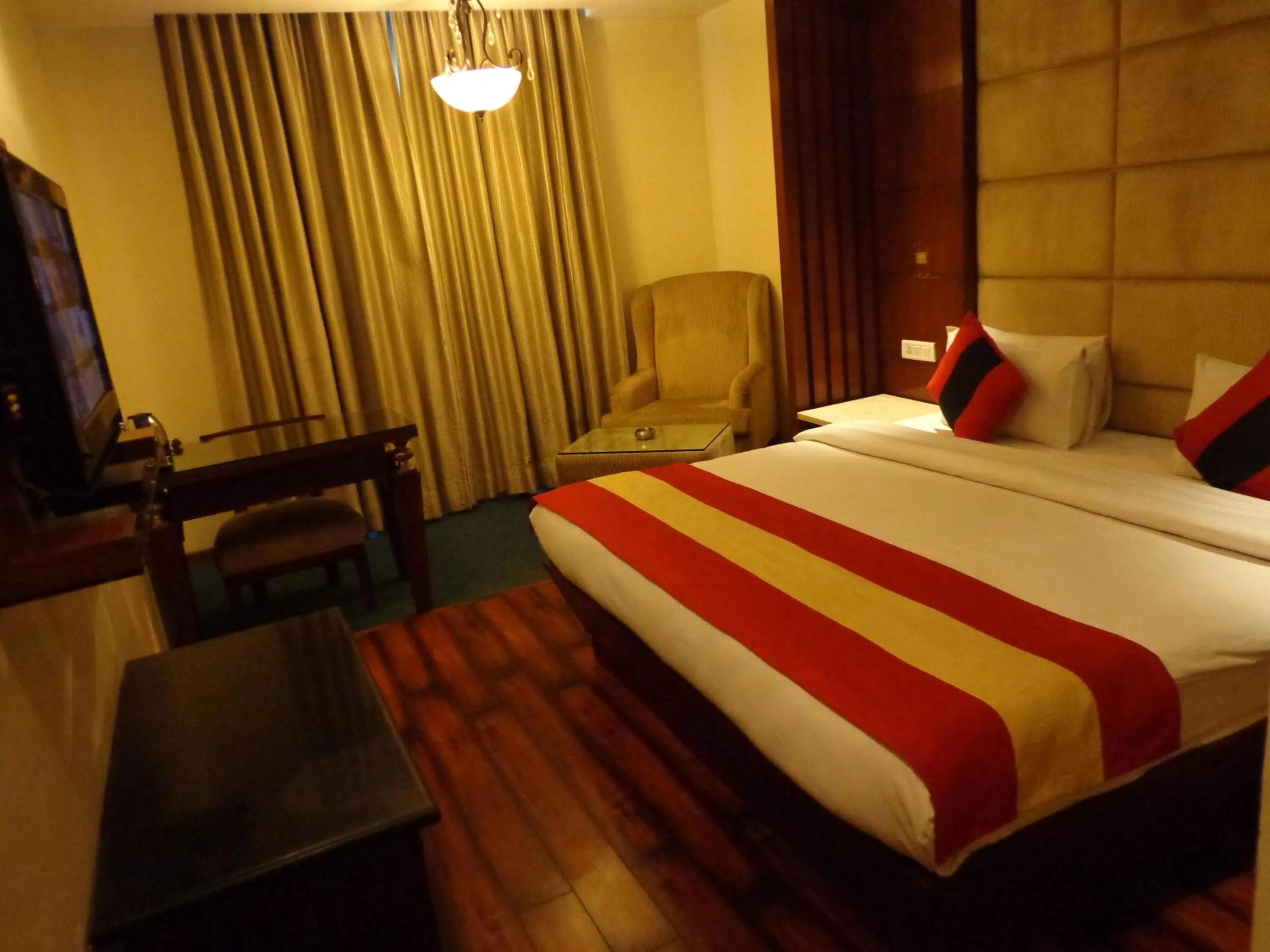 Photo of the whole room, Bed in Hotel Aura Near Connaught Place