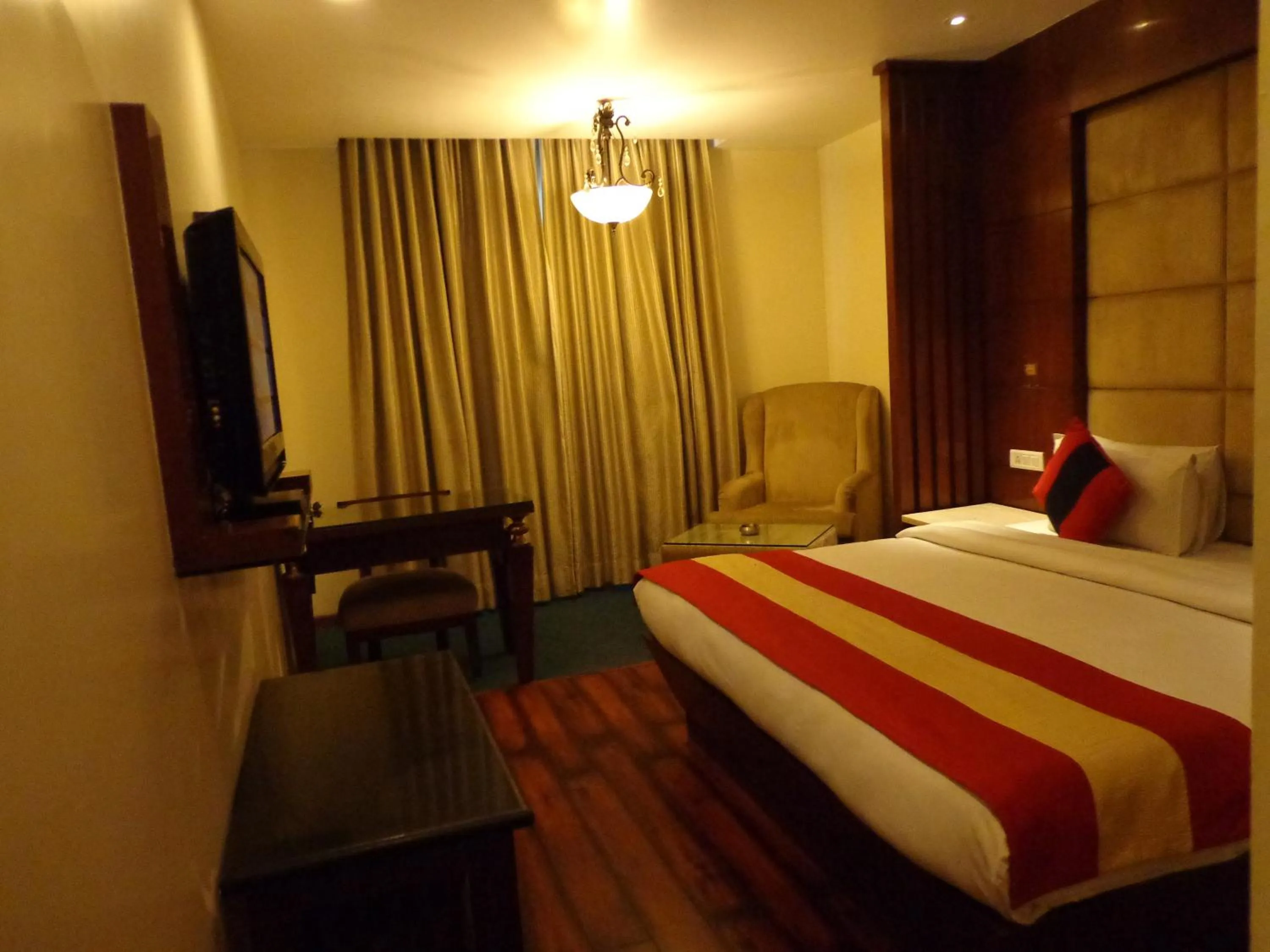 Photo of the whole room, Bed in Hotel Aura Near Connaught Place
