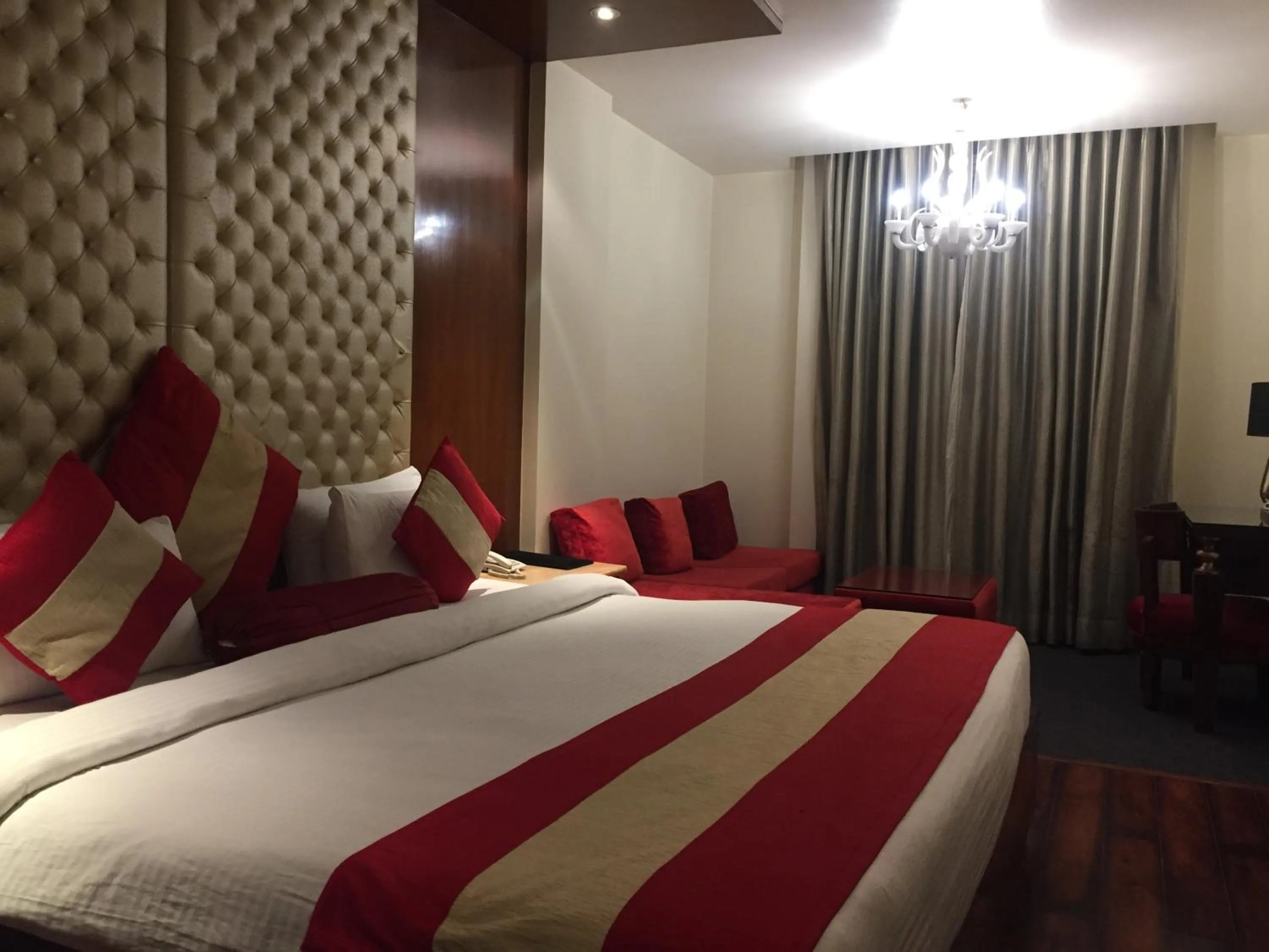Photo of the whole room, Bed in Hotel Aura Near Connaught Place