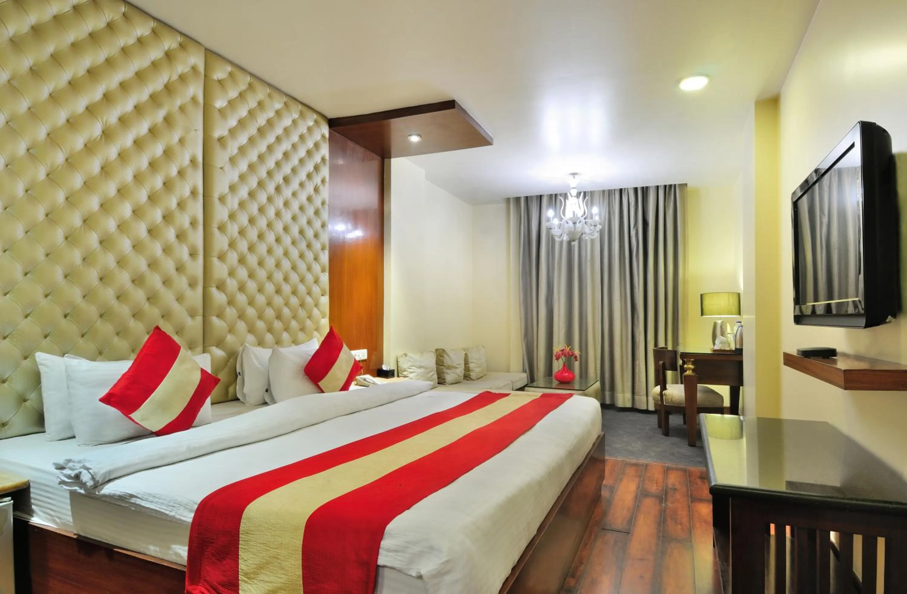 Photo of the whole room, Bed in Hotel Aura Near Connaught Place