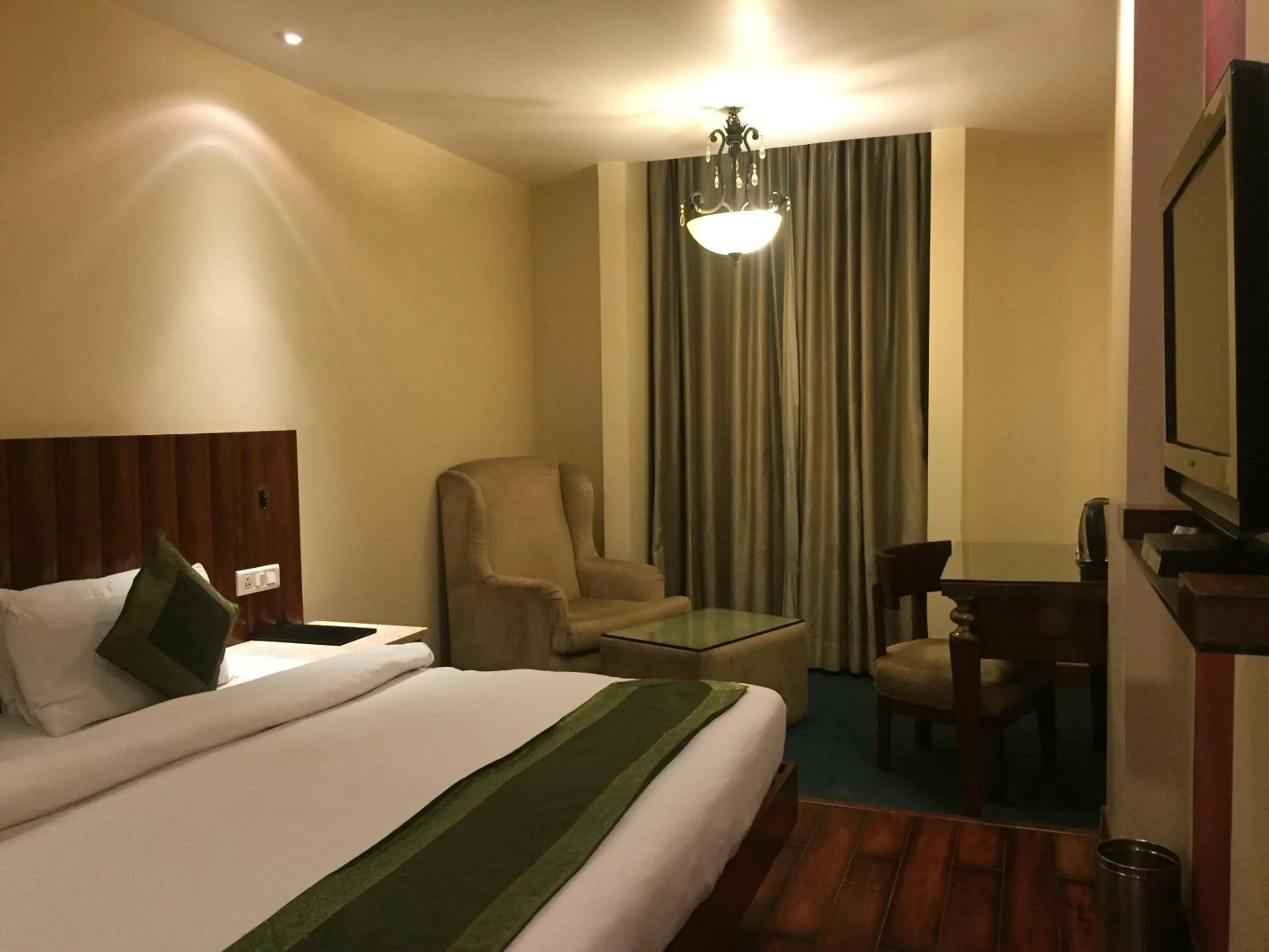 Photo of the whole room, Bed in Hotel Aura Near Connaught Place