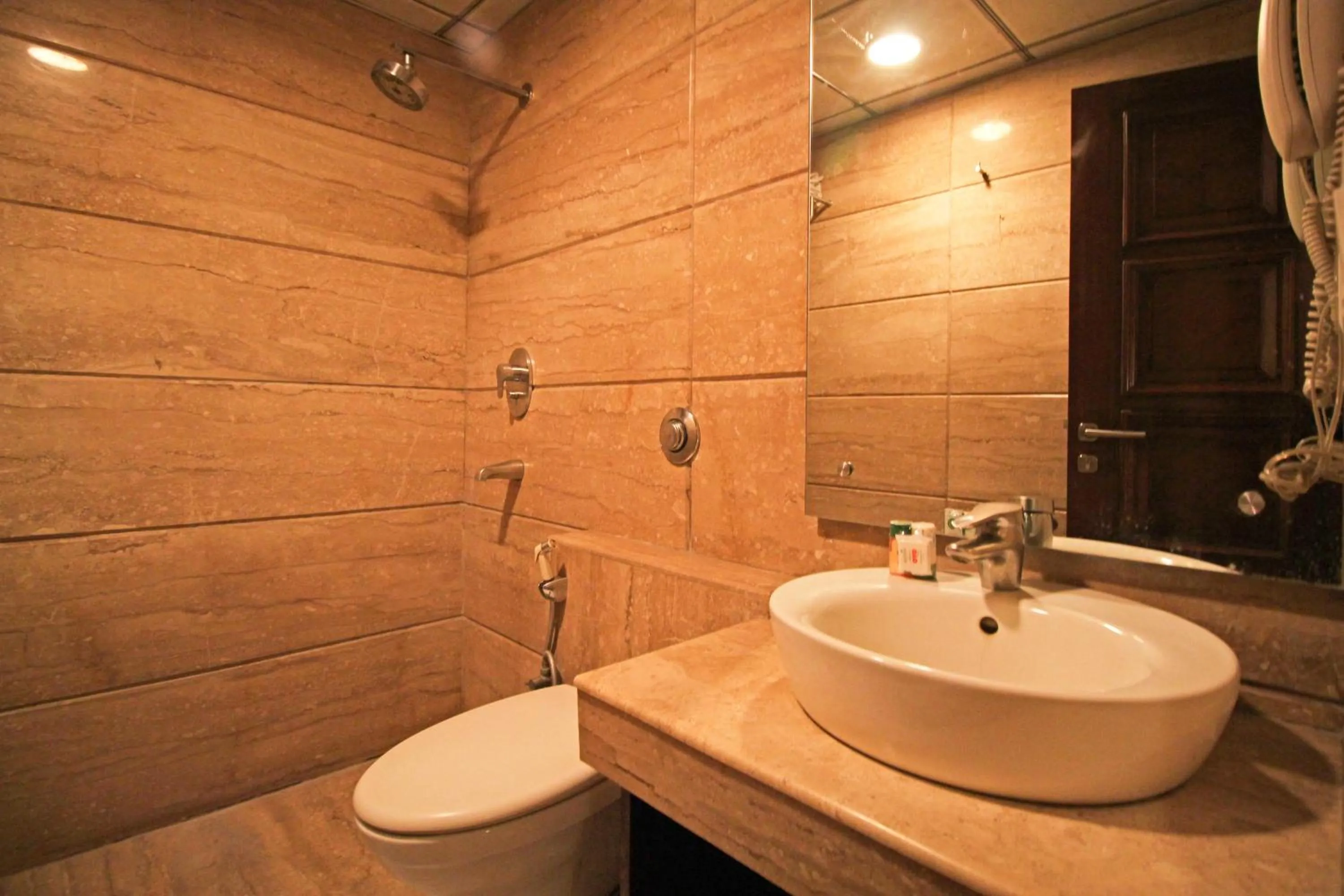 Bathroom in Hotel Aura Near Connaught Place