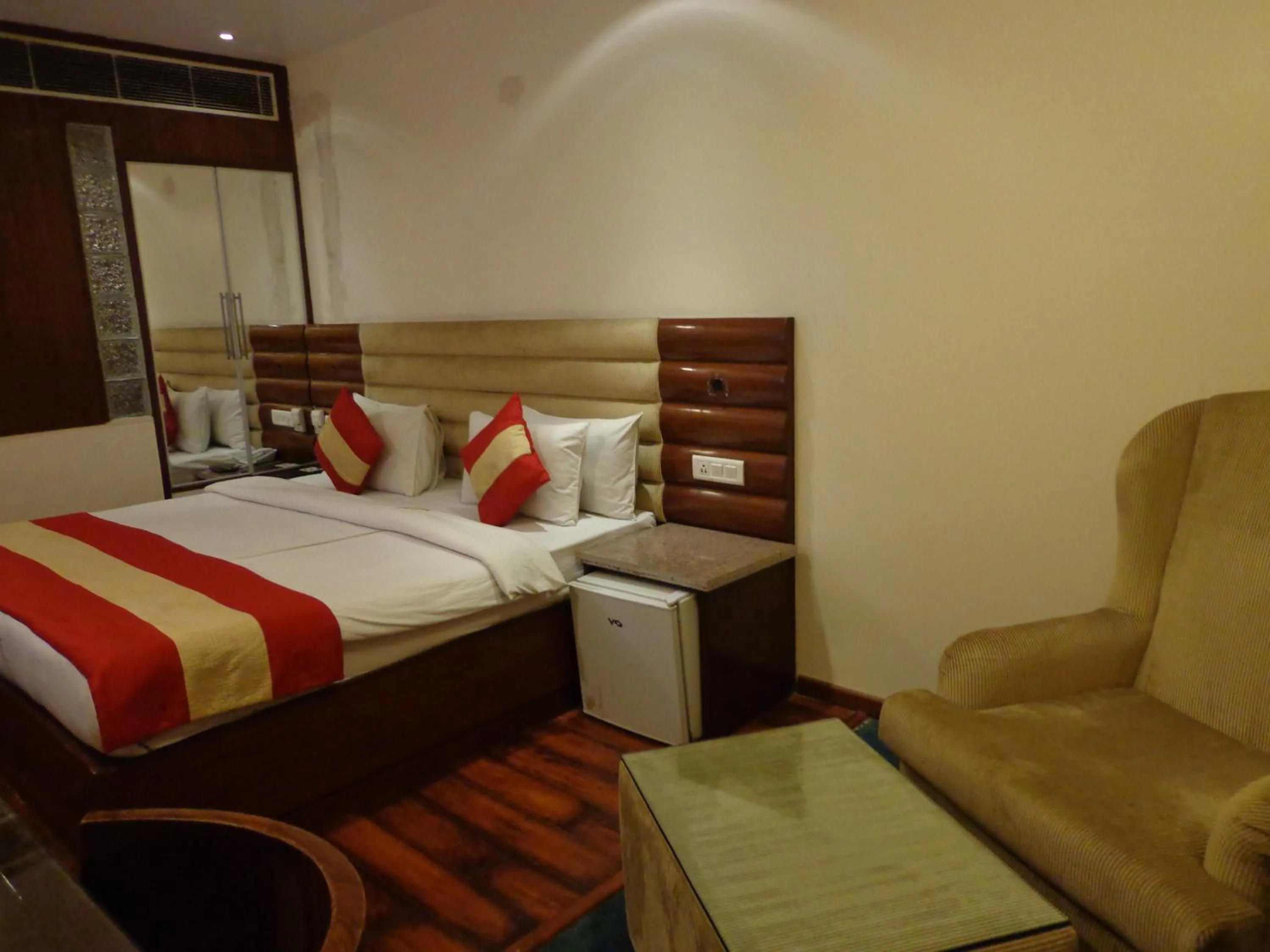 Seating area, Bed in Hotel Aura Near Connaught Place