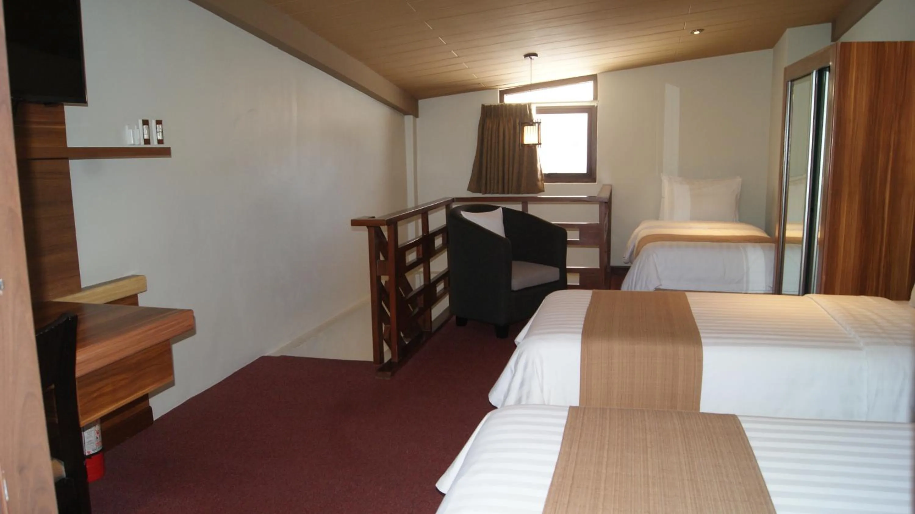 Bed in Grand Sierra Pines Baguio