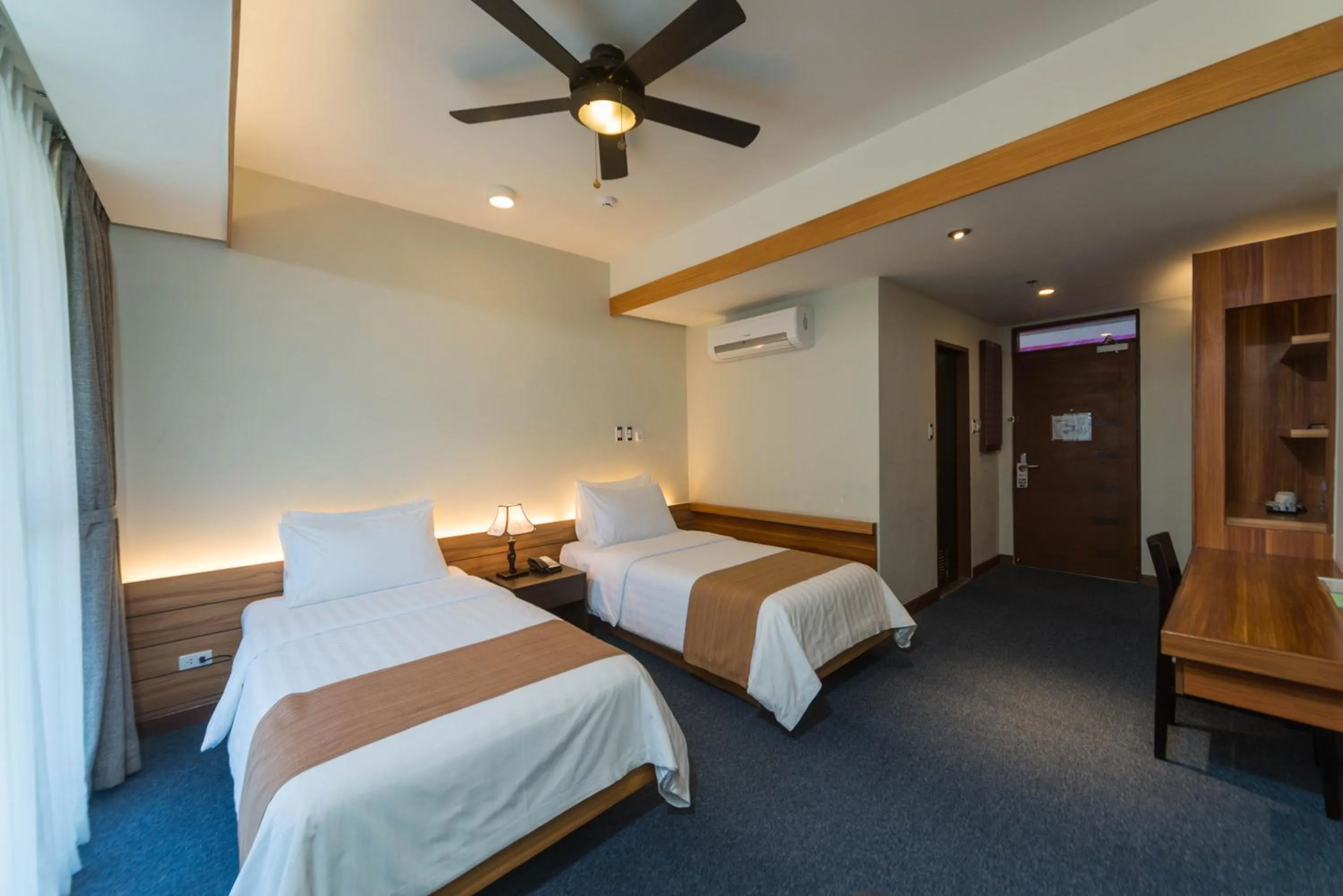 Bed in Grand Sierra Pines Baguio