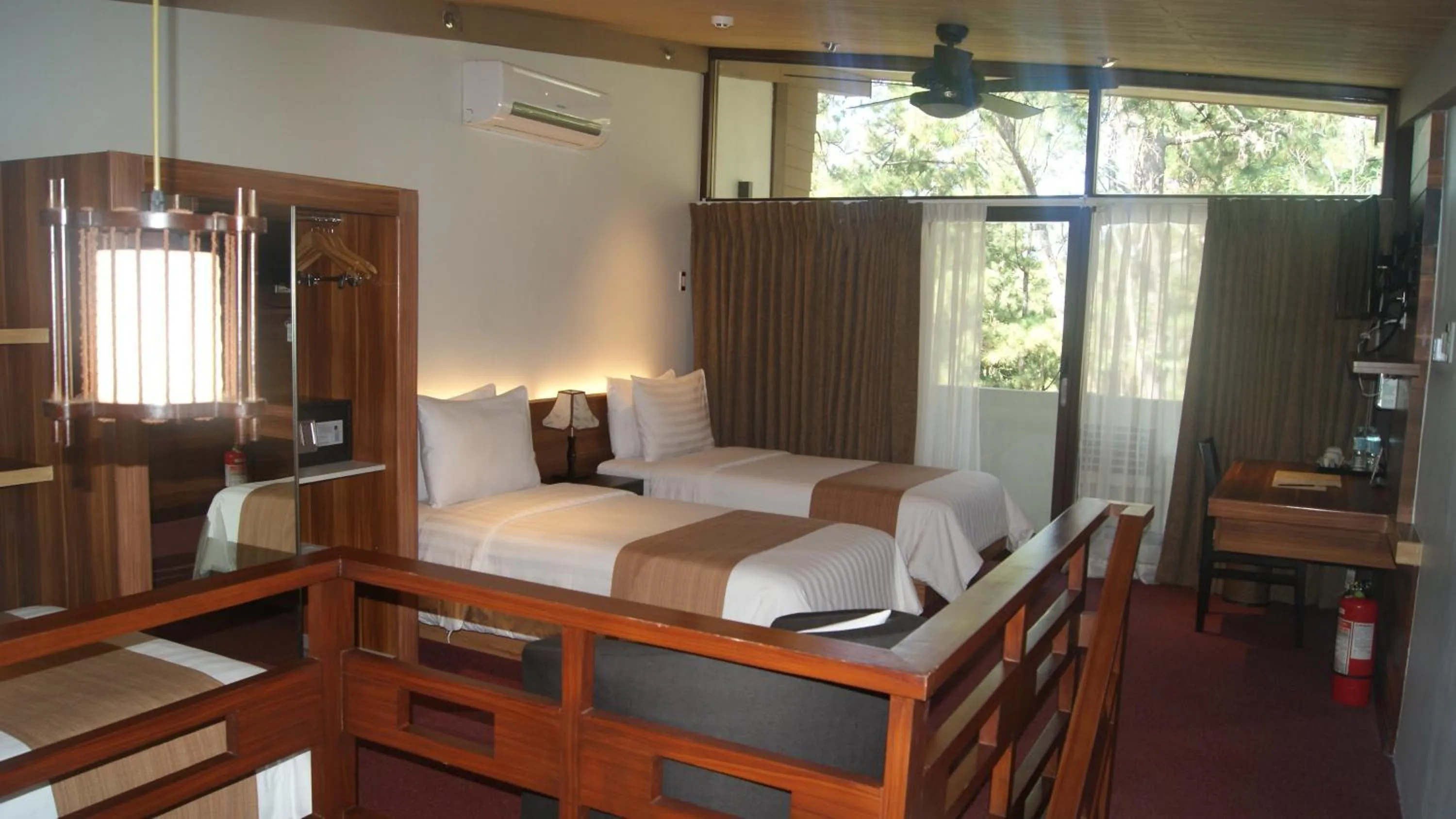 Bed in Grand Sierra Pines Baguio