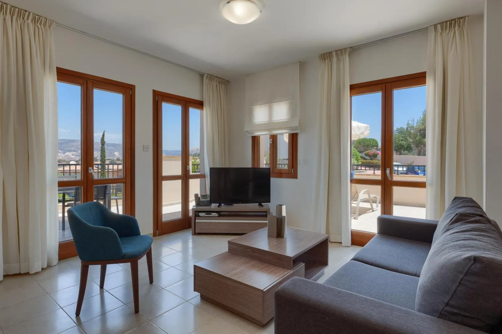 Living room in Aphrodite Hills Rentals - Apartments