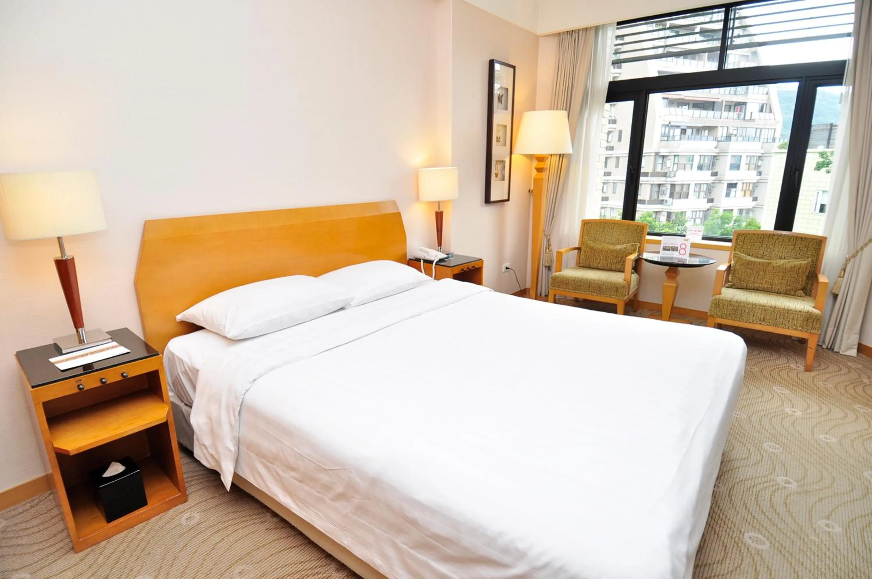 Photo of the whole room, Bed in Spring City Resort