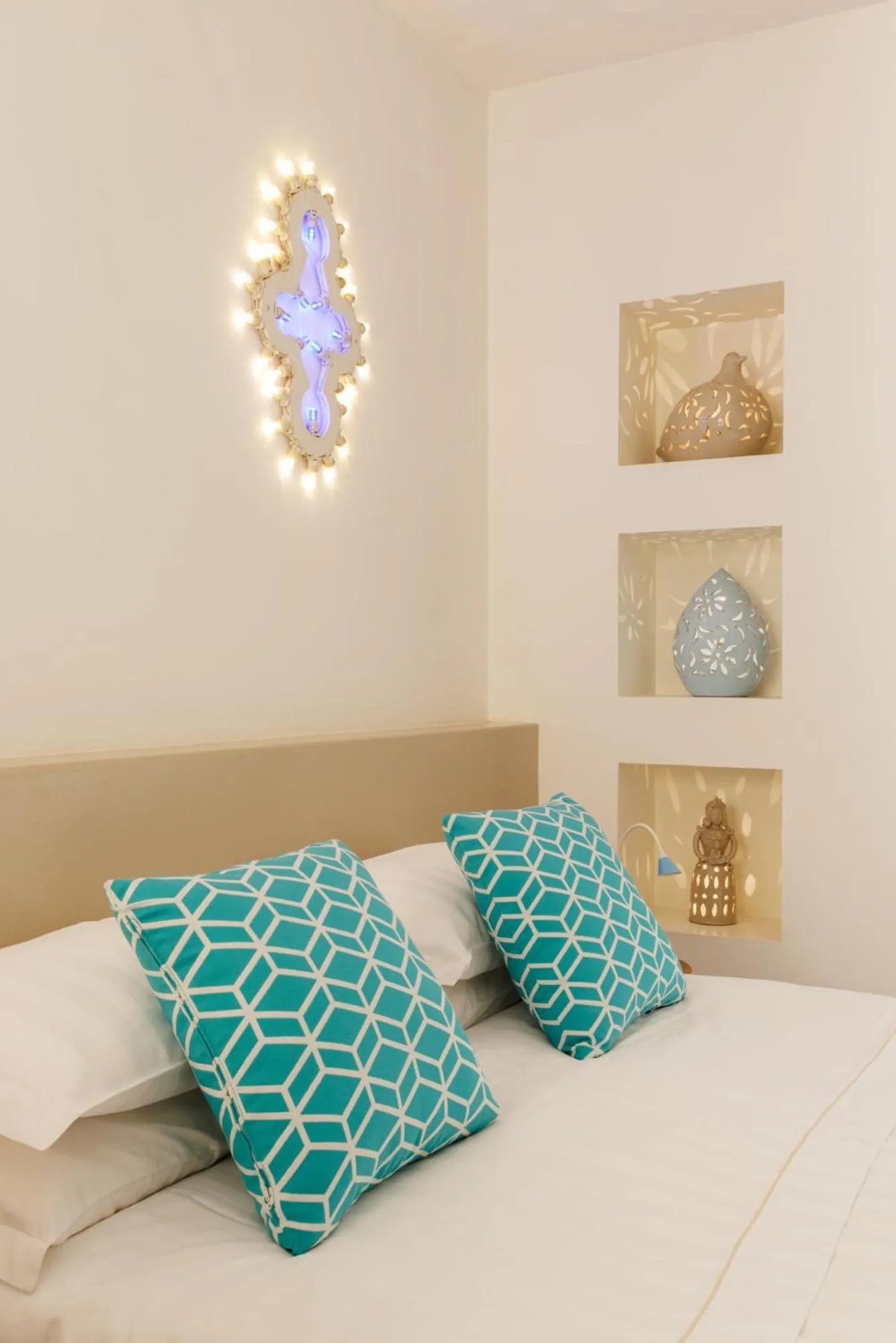 Decorative detail, Bed in Borgo de li Santi