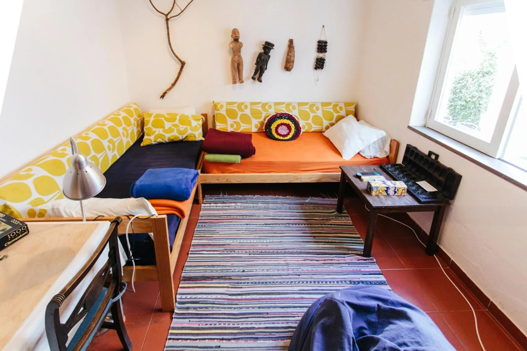 Communal lounge/ TV room, Bed in Olive Hostel Lagos