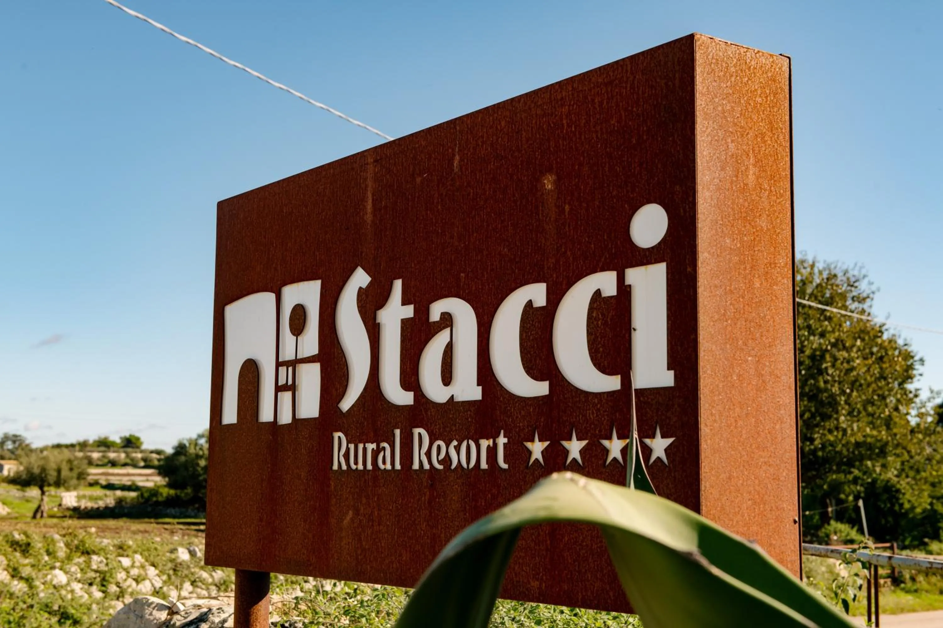 Property logo or sign in Stacci Rural Resort