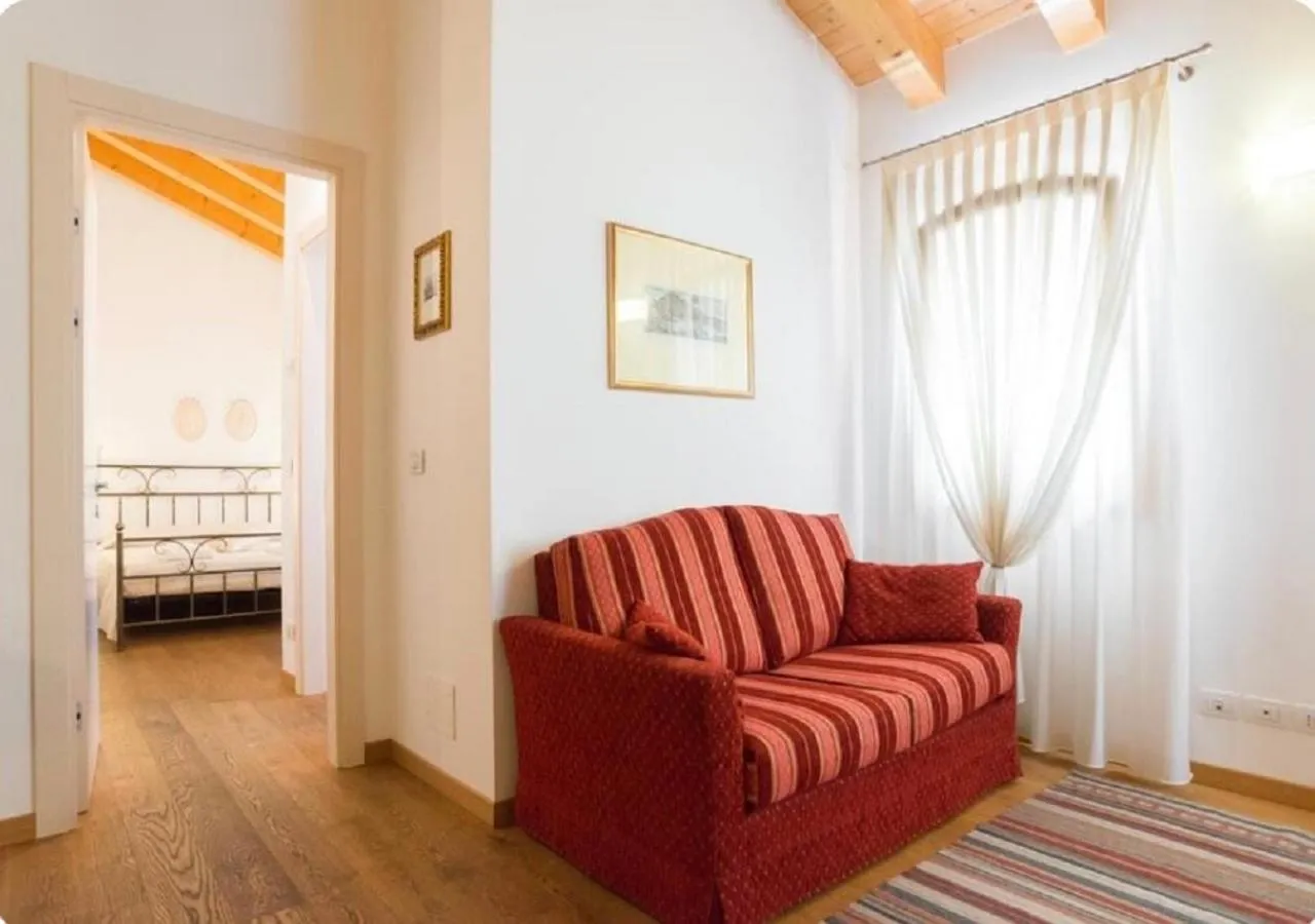 Communal lounge/ TV room, Bed in Al Piccolo Clarin