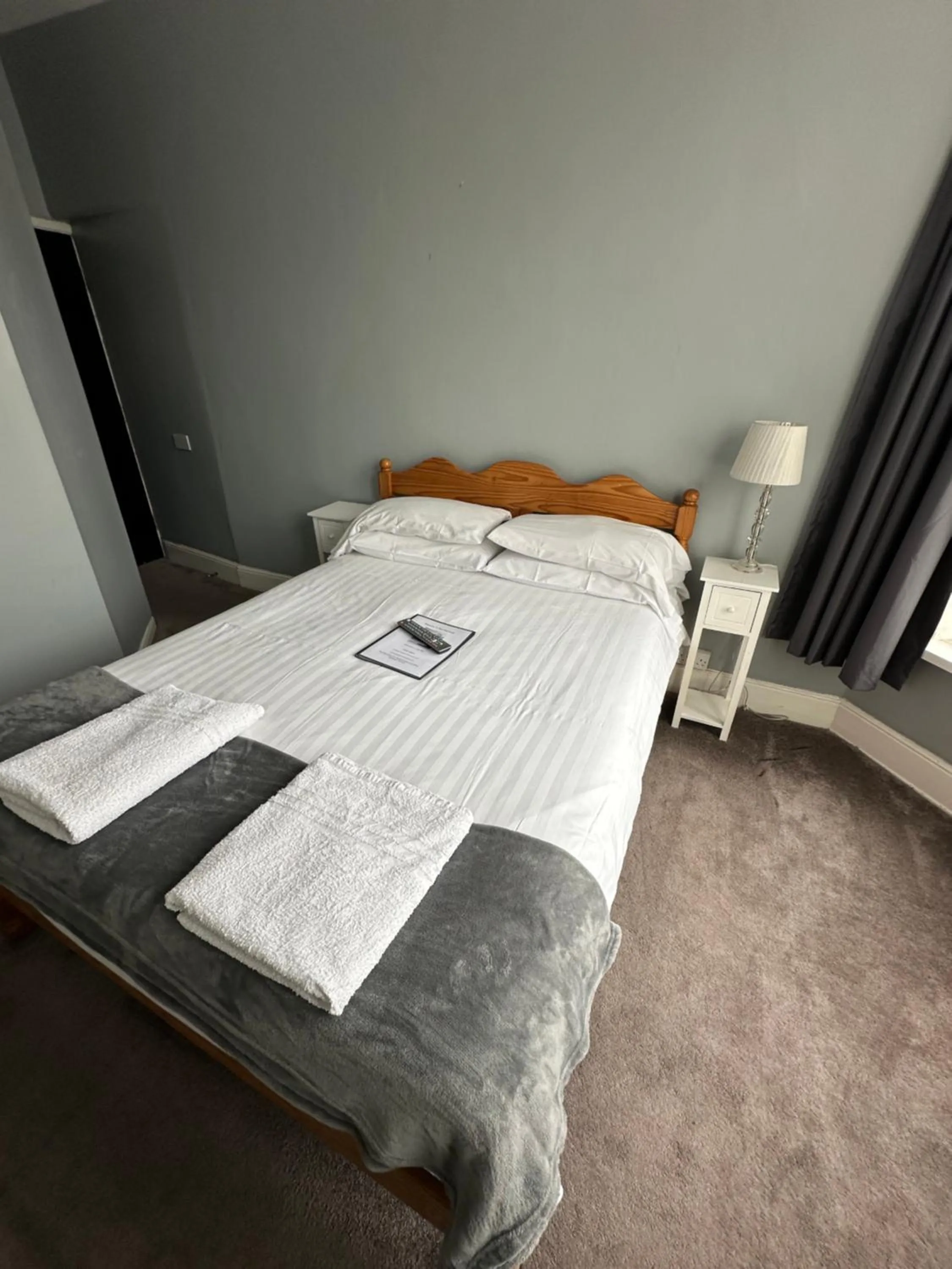 Bed in The Villa Hotel