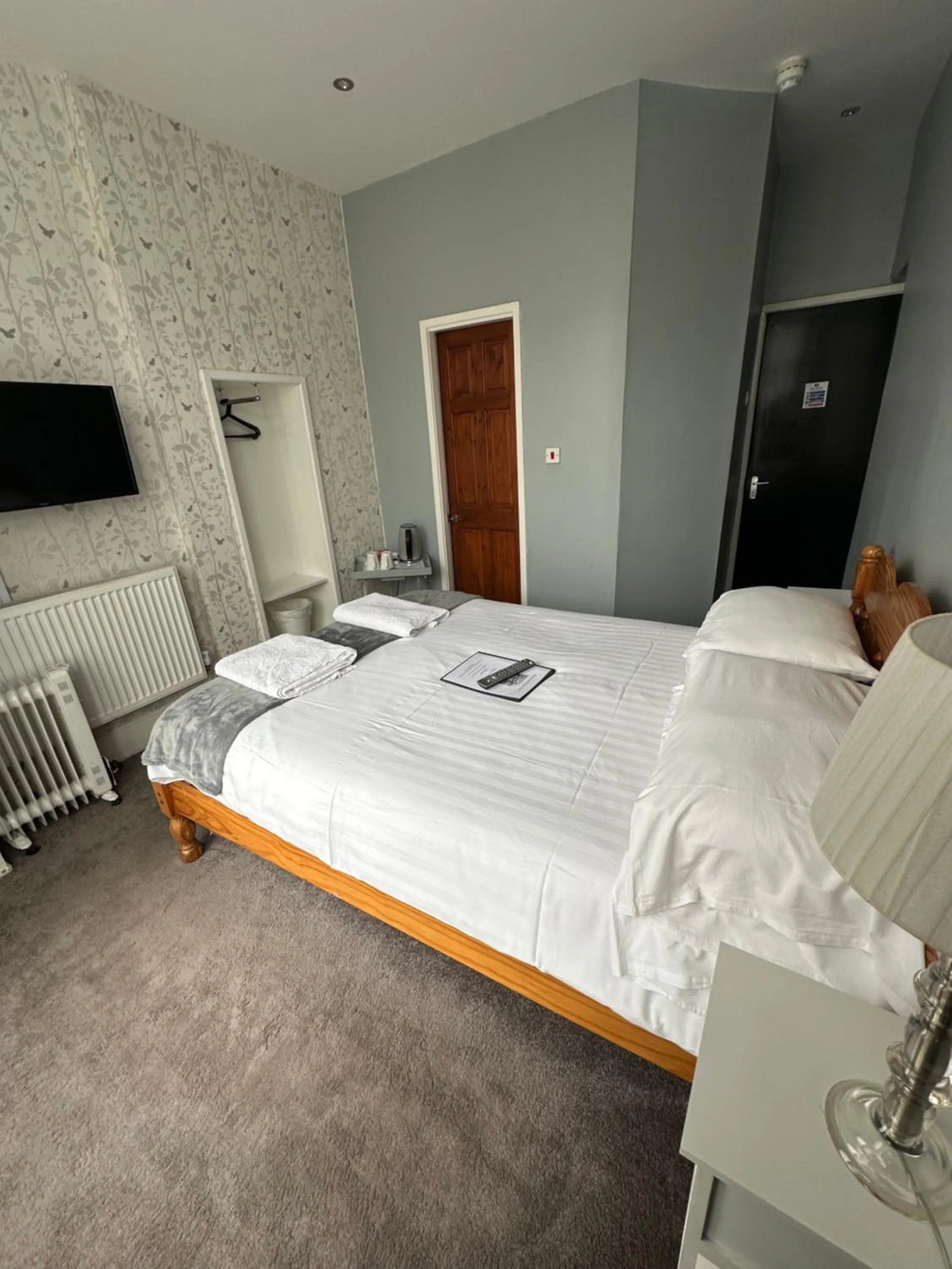 Bed in The Villa Hotel