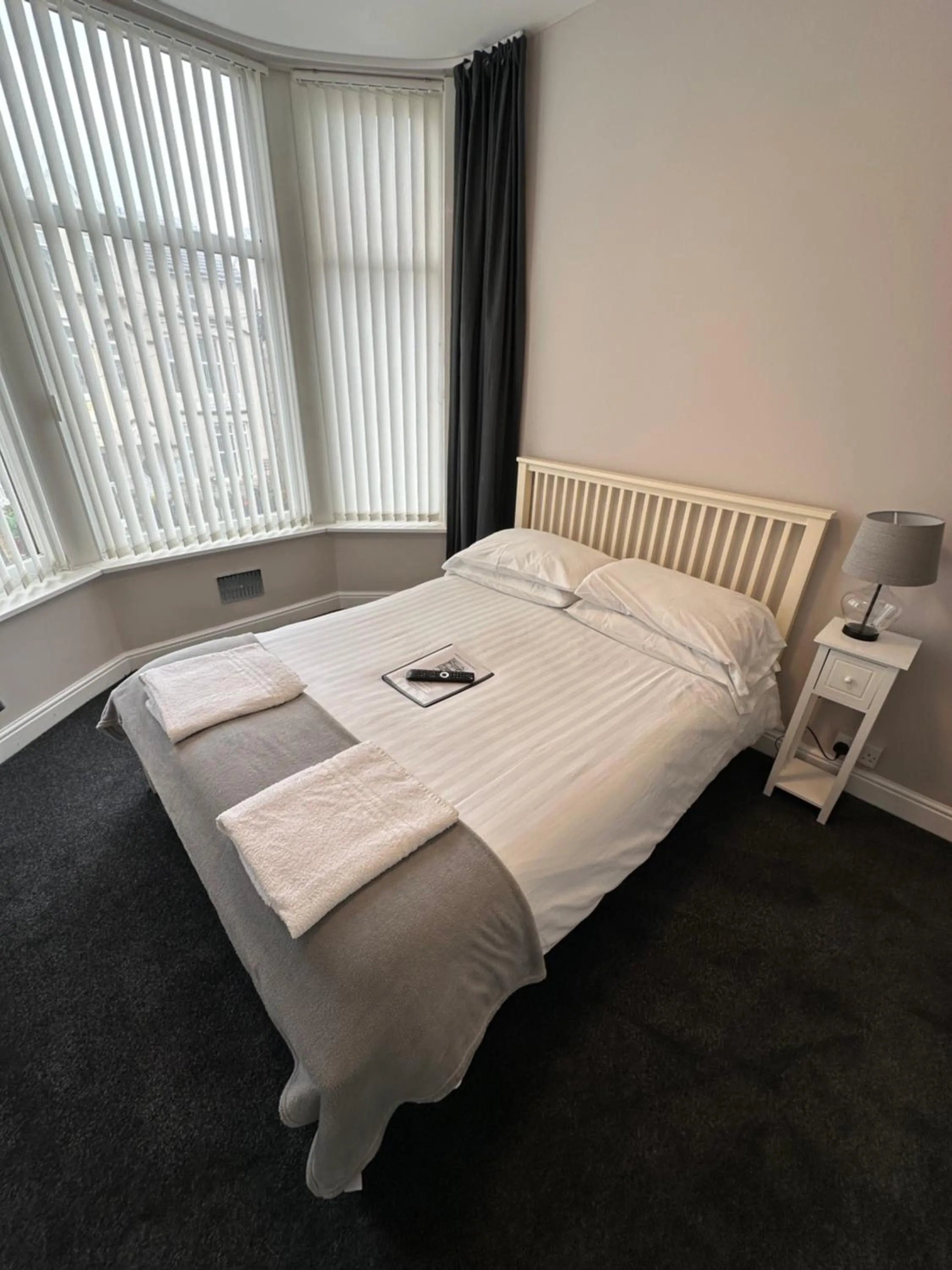 Bed in The Villa Hotel