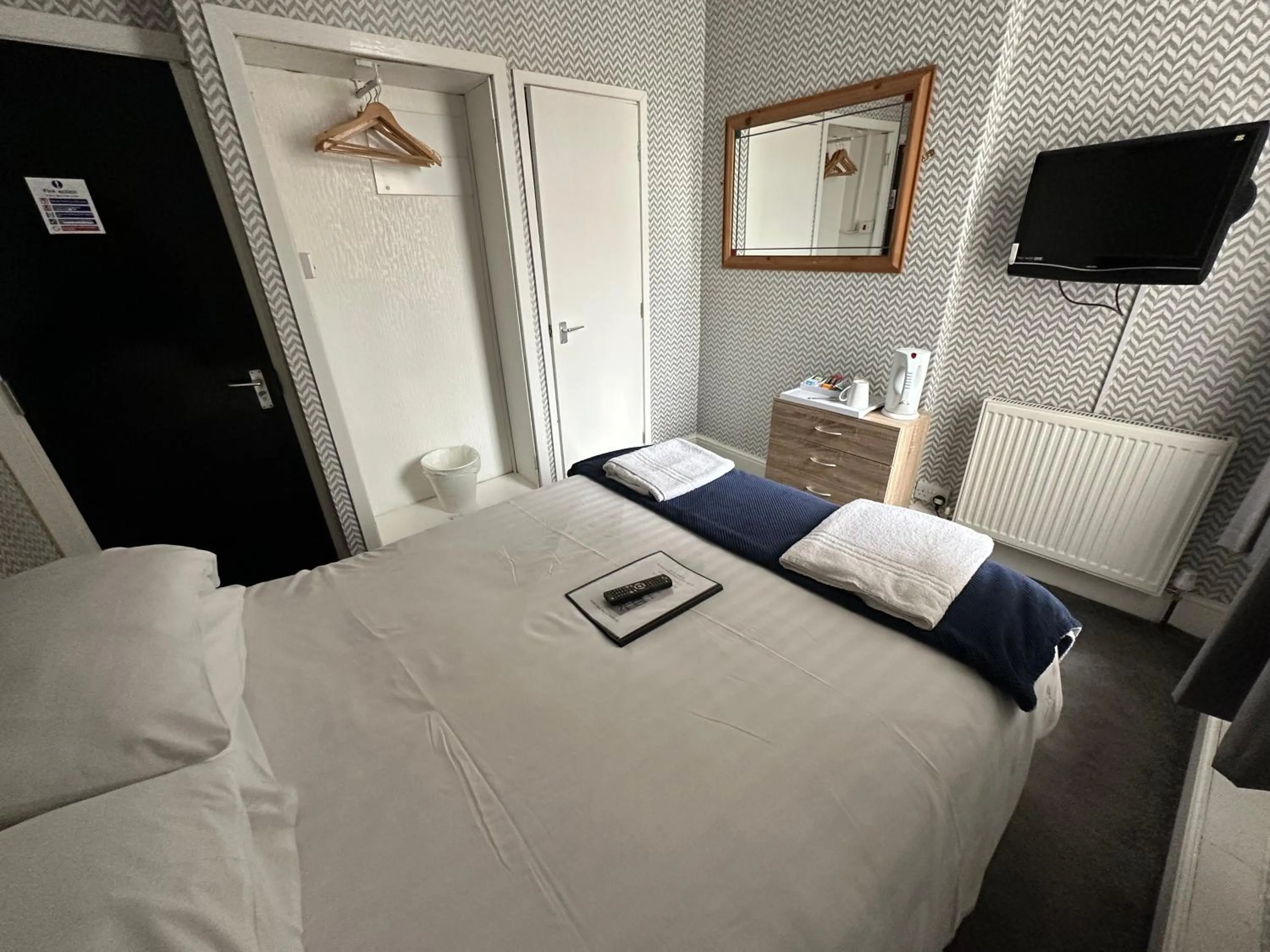 Bed in The Villa Hotel