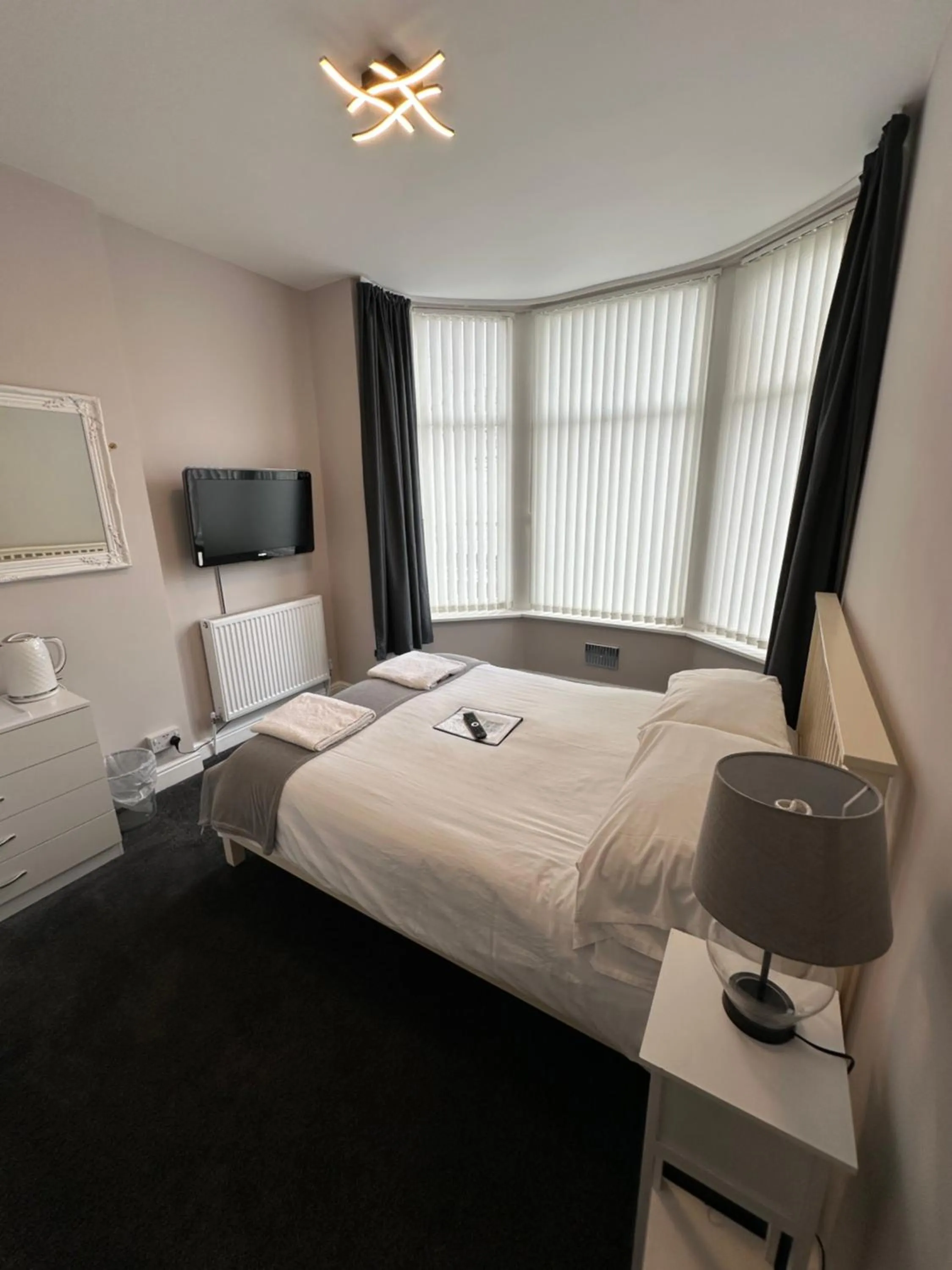 Bed in The Villa Hotel