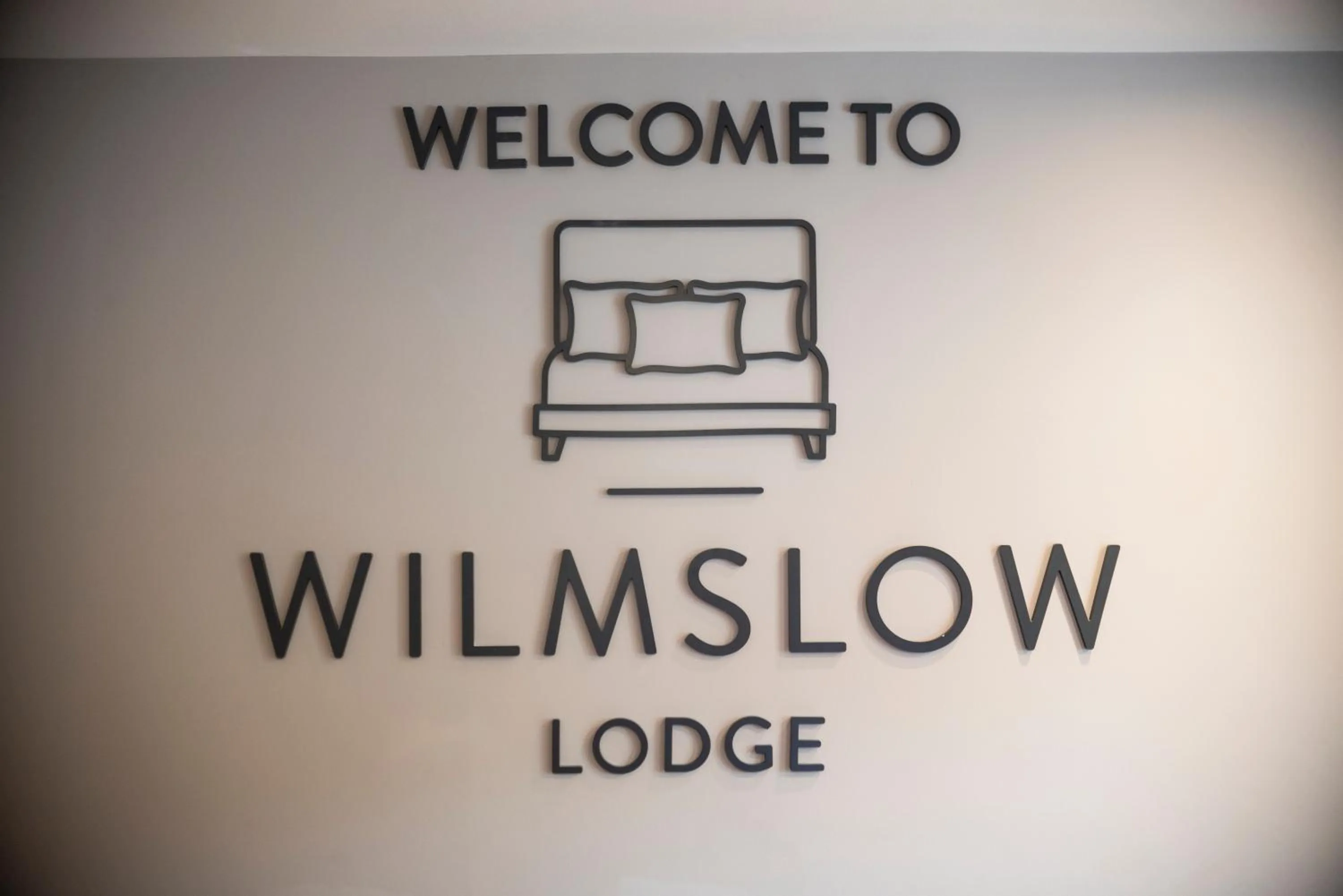 Property logo or sign in Wilmslow Lodge