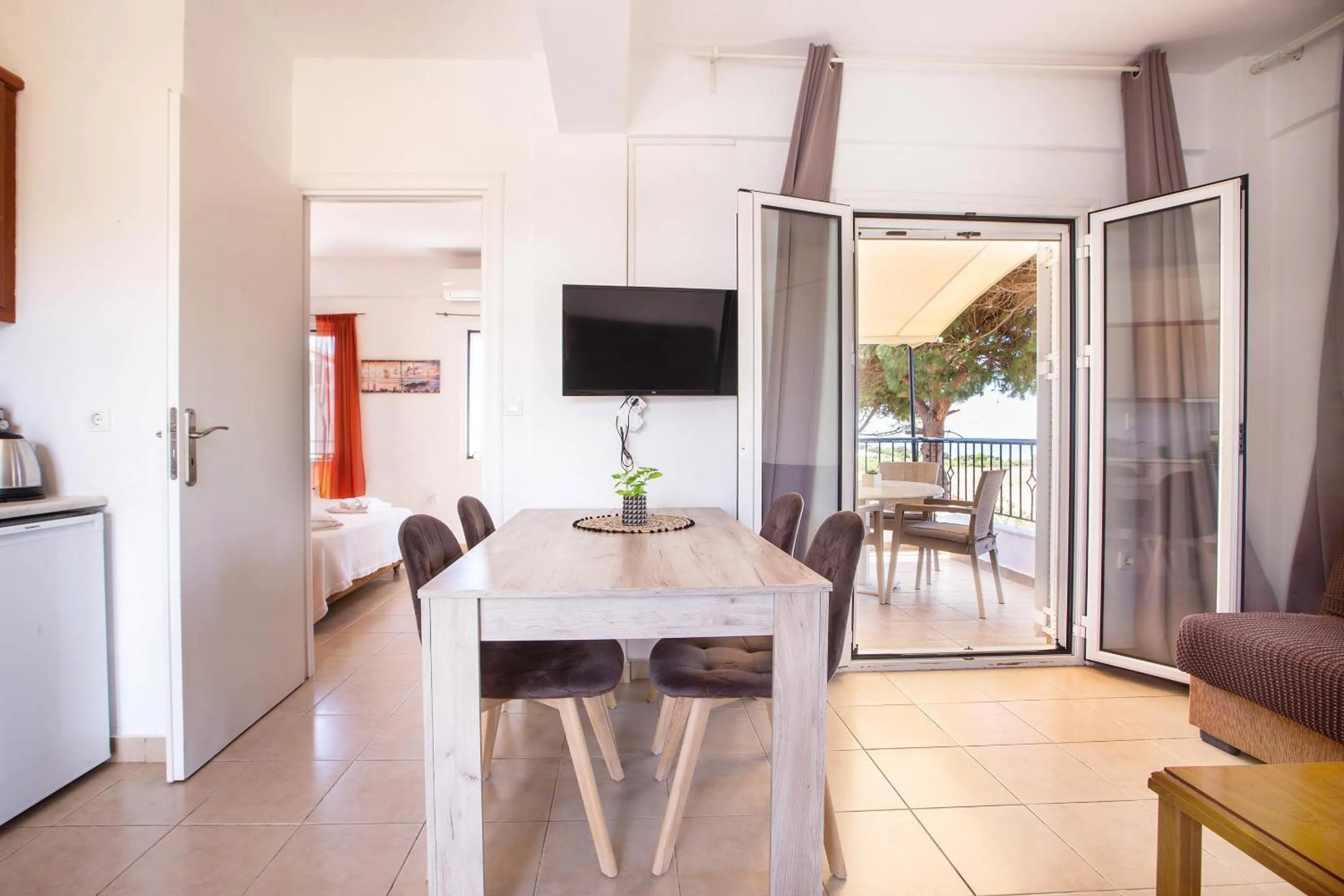TV and multimedia in Romanos Beach Villas