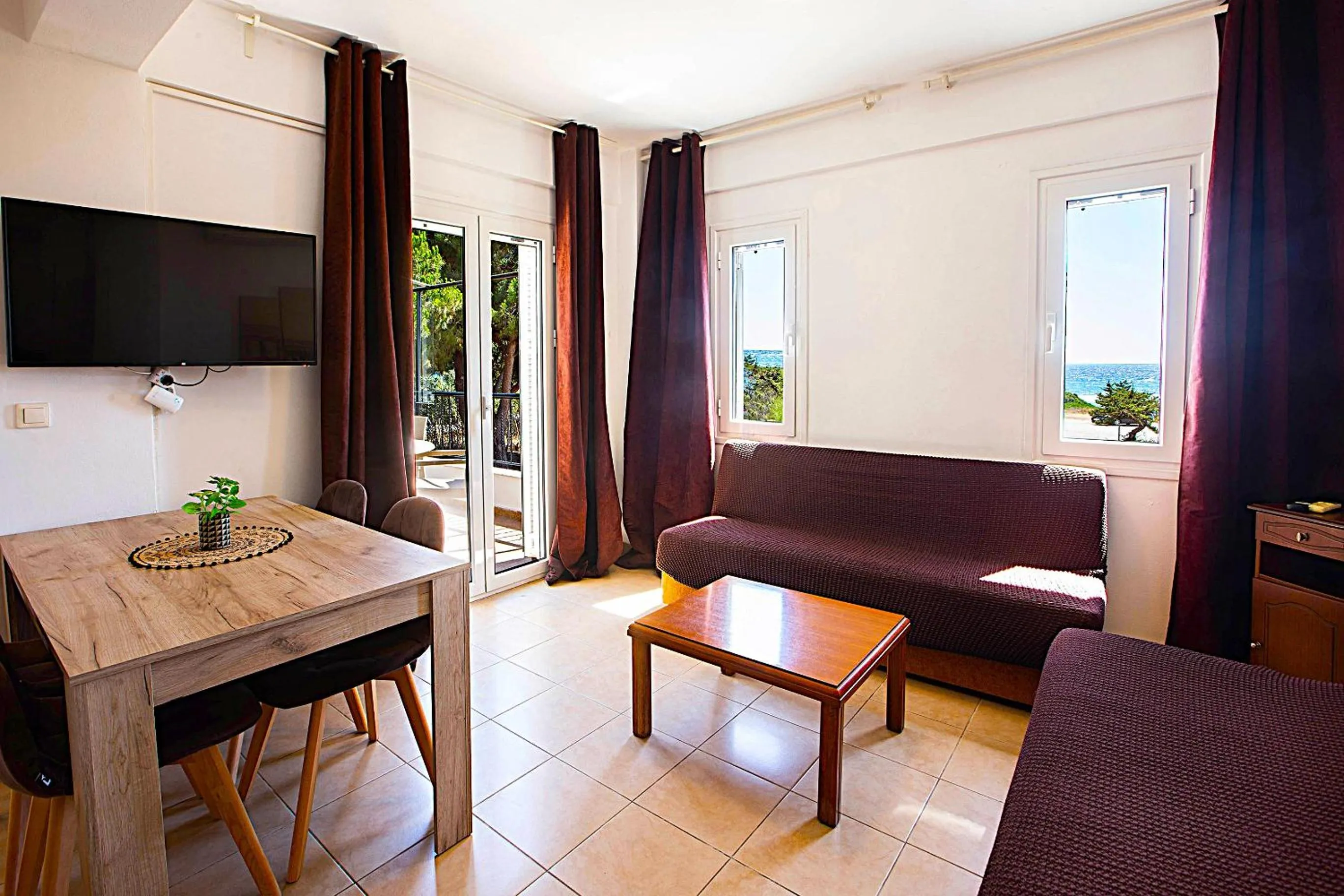 TV and multimedia in Romanos Beach Villas
